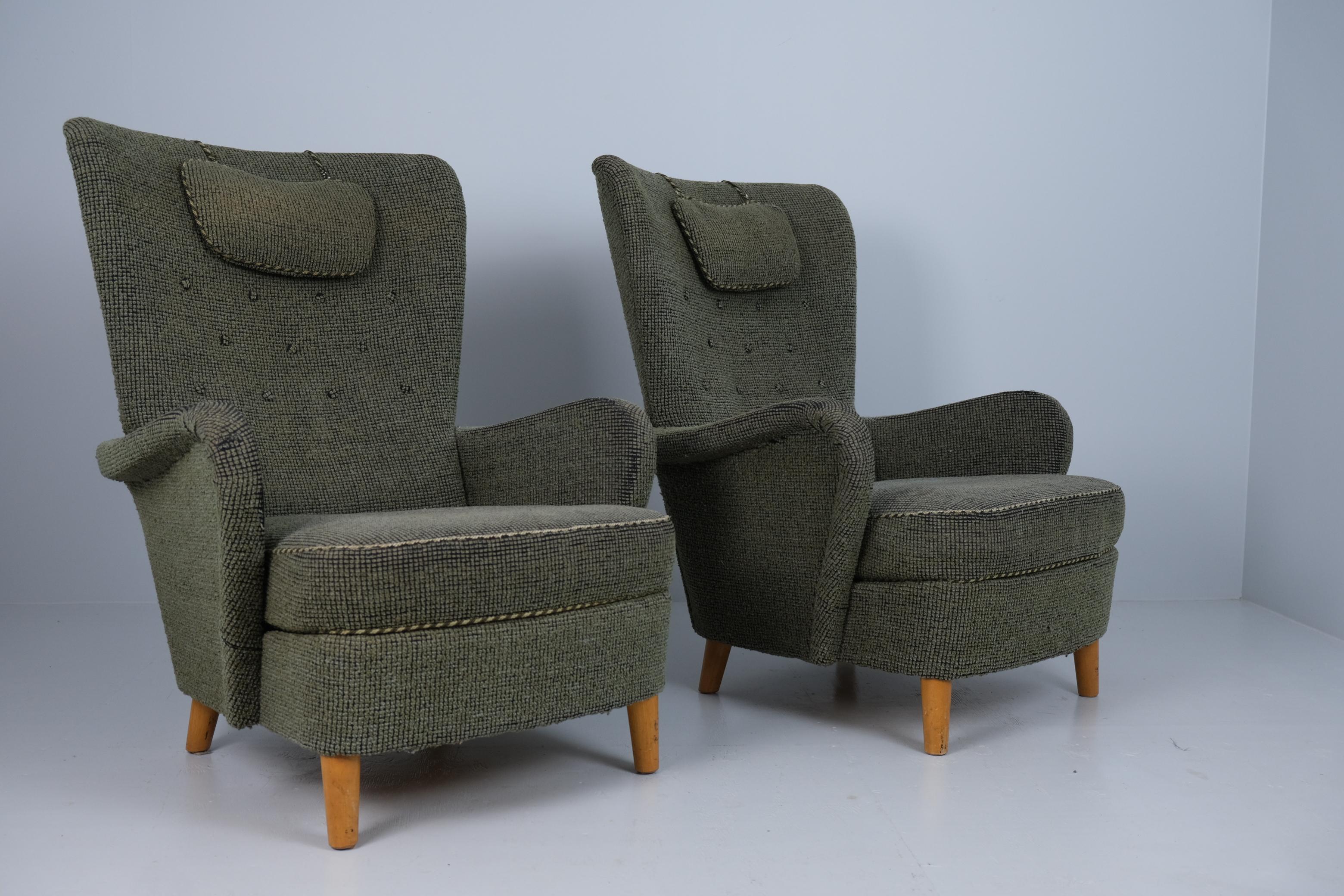 Ein Paar elegante 1950er Asko Oy Sessel, Modell 2303

Dieses Sesselpaar wurde in den 1950er Jahren von dem renommierten finnischen Hersteller Asko Oy gefertigt und verkörpert die skandinavische Eleganz der Jahrhundertmitte. Das ursprünglich in