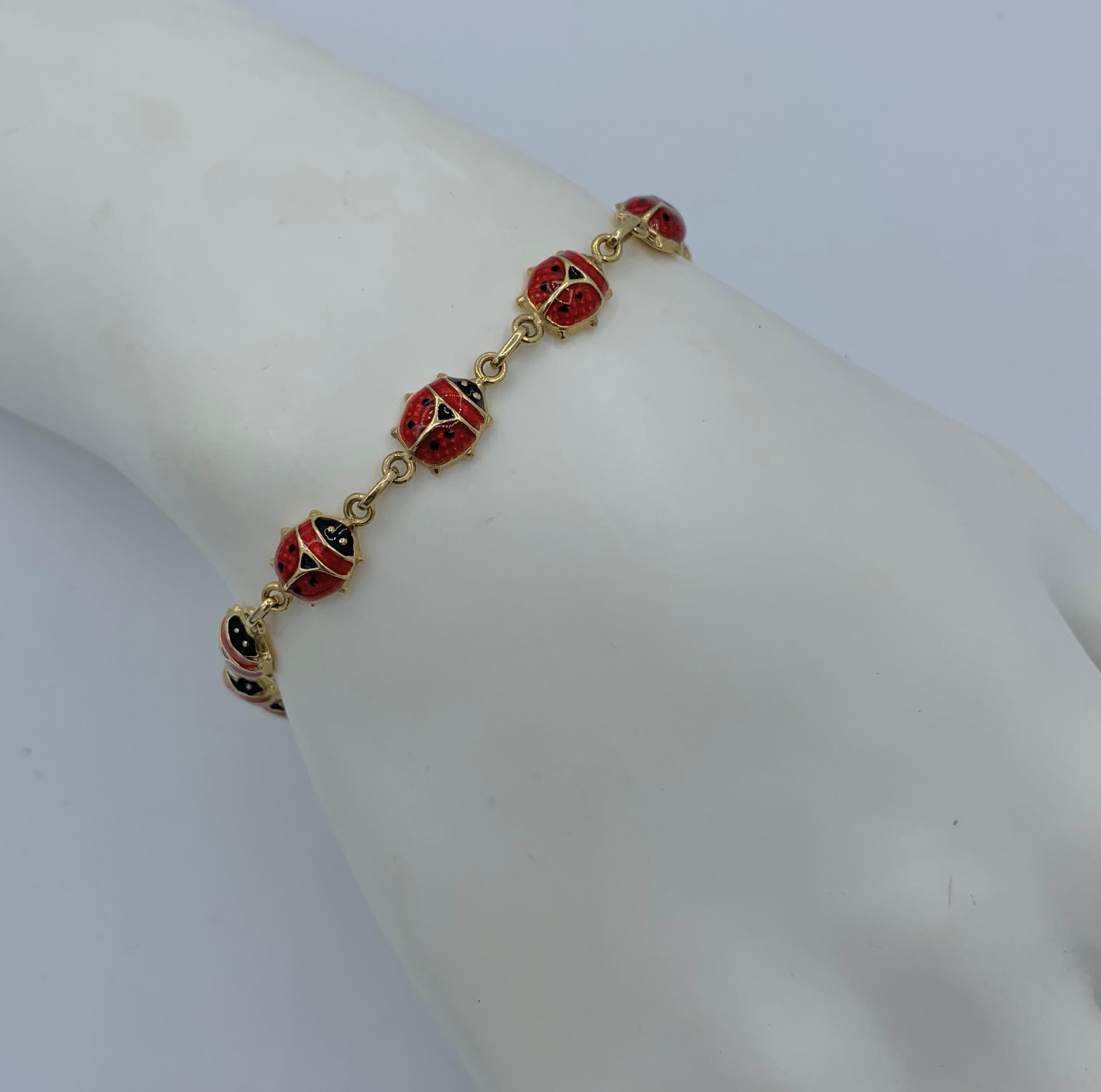 These are absolutely delightful 14 Karat Gold and Enamel Ladybug Earrings and matching Bracelet.  The ladybugs are adorable and done with red and black enamel on 14 Karat Gold.  The work is exquisite.  The jewels are beautifully made.  This