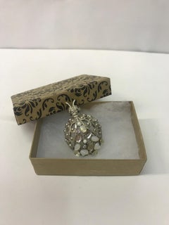 Ladybug brooch with gems set by designer Oscar De La Renta.