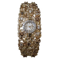 Reloj de señora Omega de 14 quilates con diamantes de fantasía