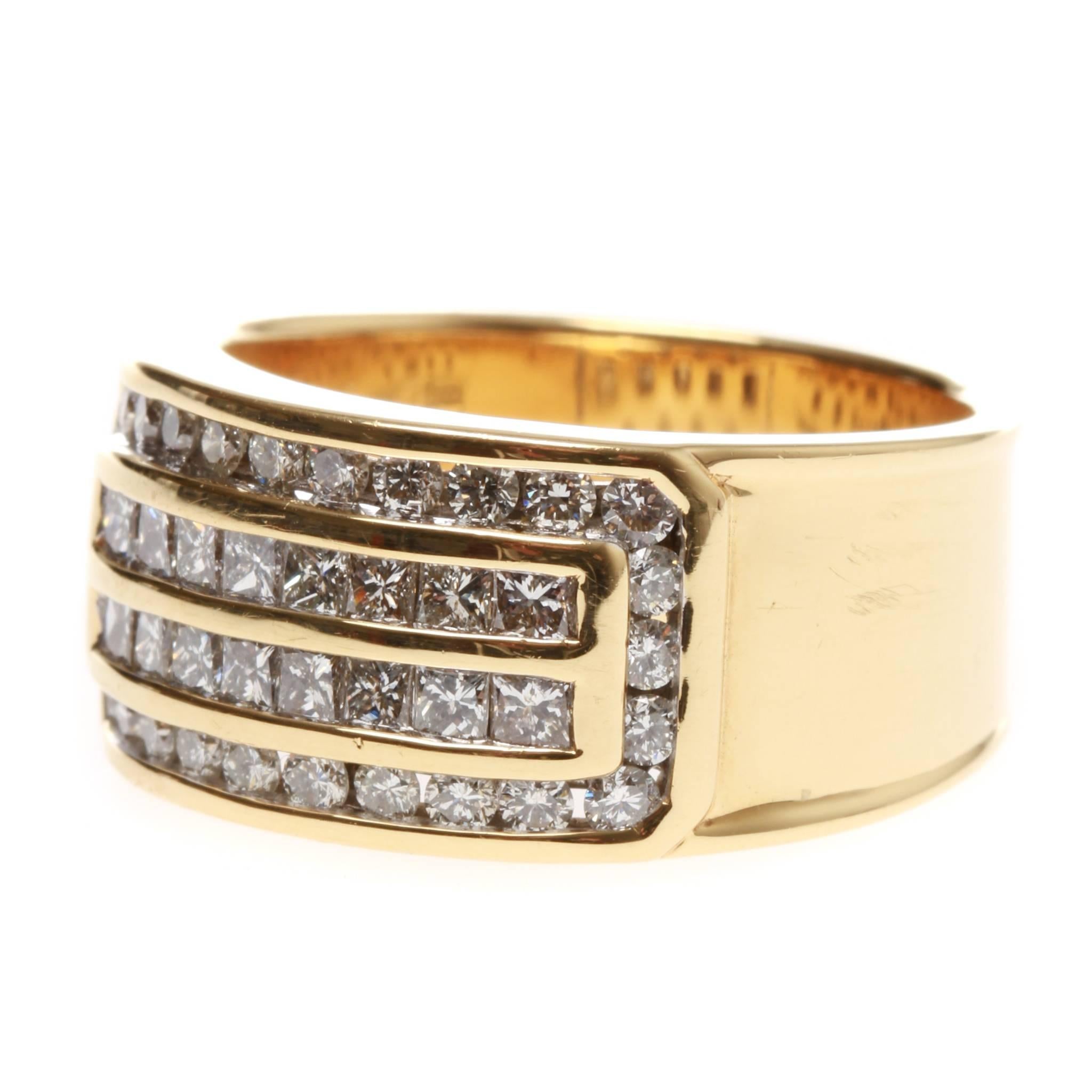 One lady's, cast, 18ct yellow gold multistone diamond band ring. Wide, low half round, tapered and lipped edged band of 9.97mm to 7.18mm in width x 1.12mm in depth (at base). Open setting backs with plain and tapering shoulders.
Feature curved top