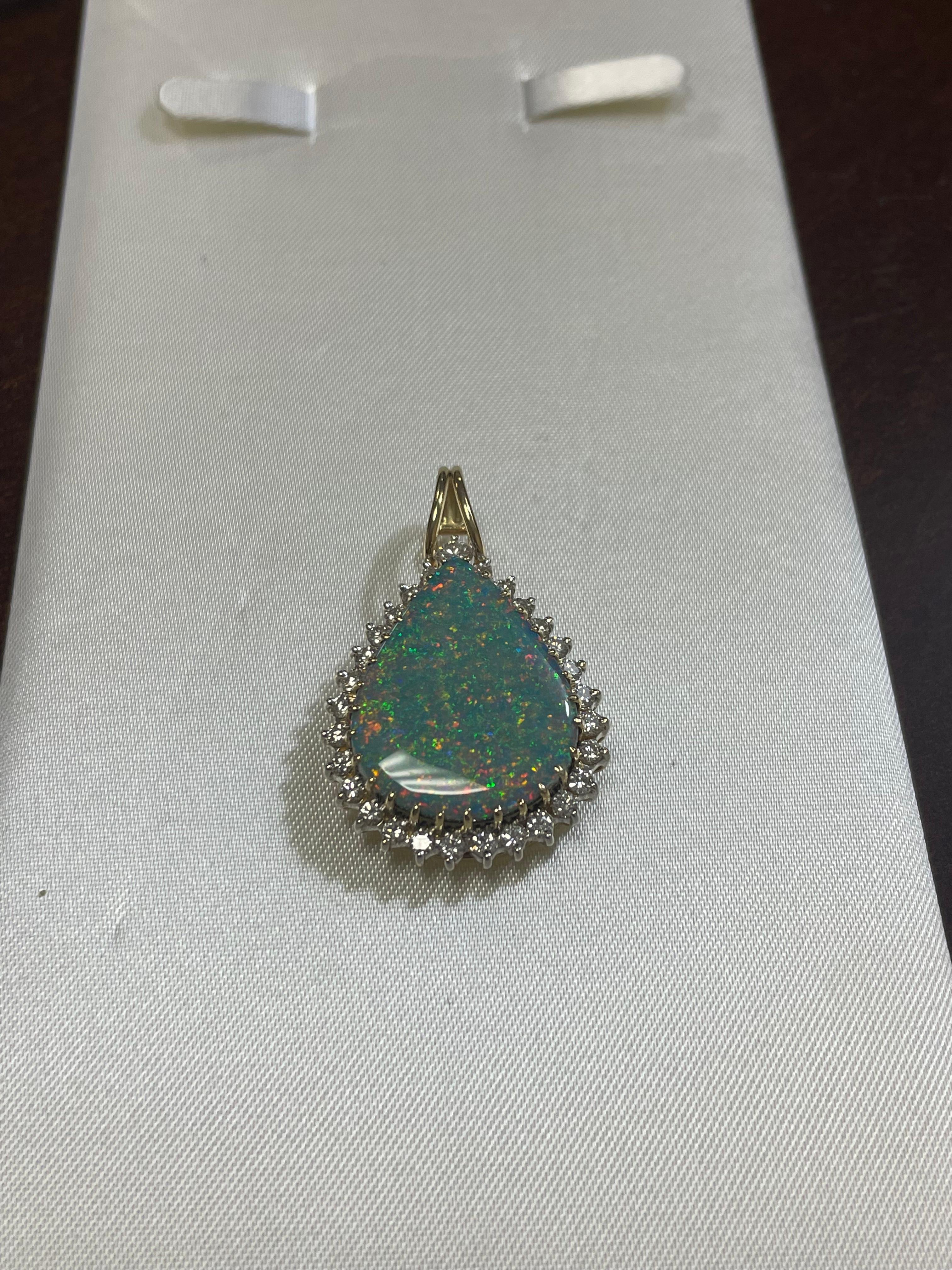Art Deco Lady's Black Opal and Diamond Pendant in 14k Yellow and White Gold For Sale