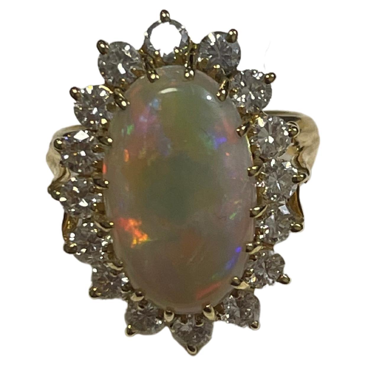 Lady's Black Opal and Diamonds Ring in 18k Yellow Gold