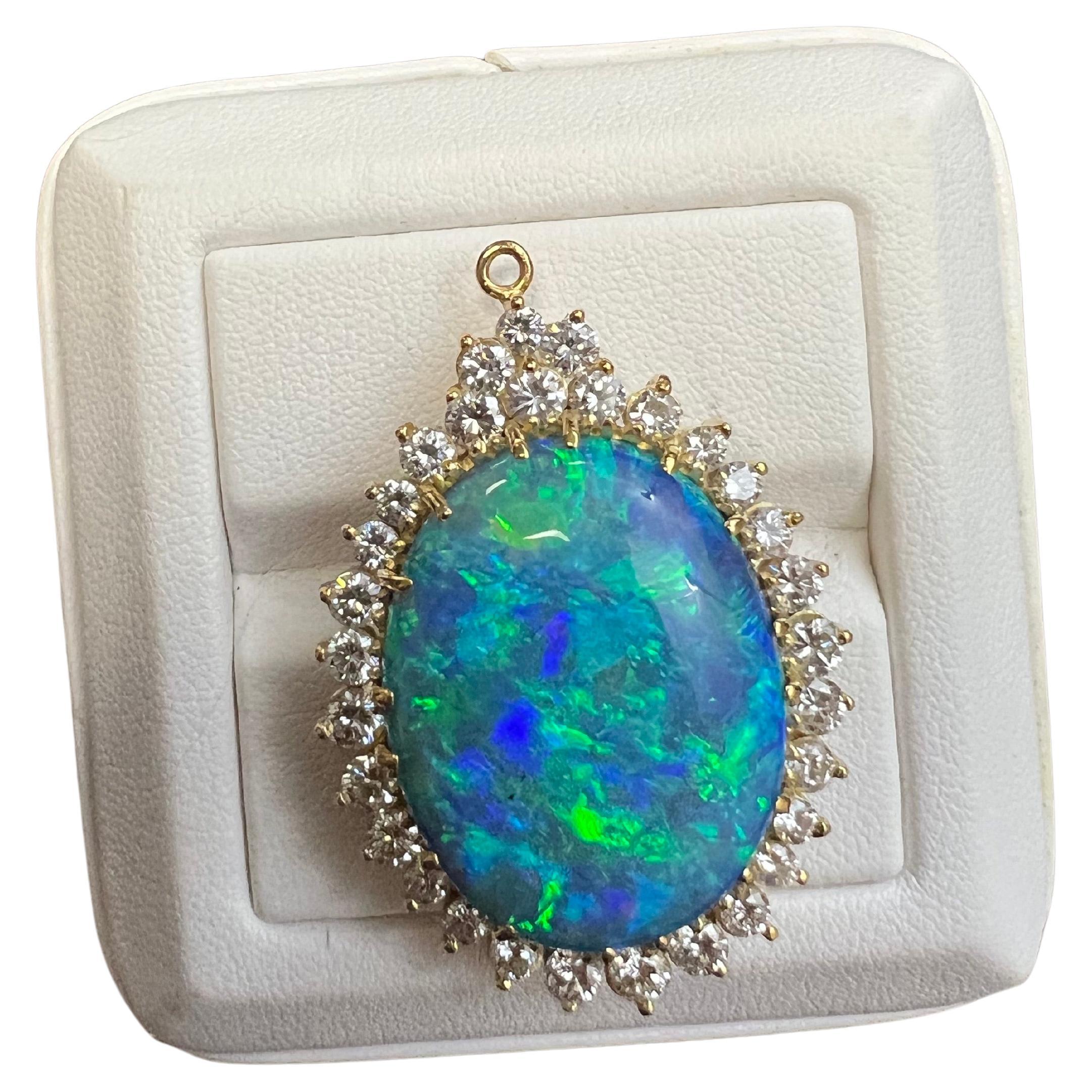 Lady's Black Opal and Pendant in 18k Yellow Gold For Sale