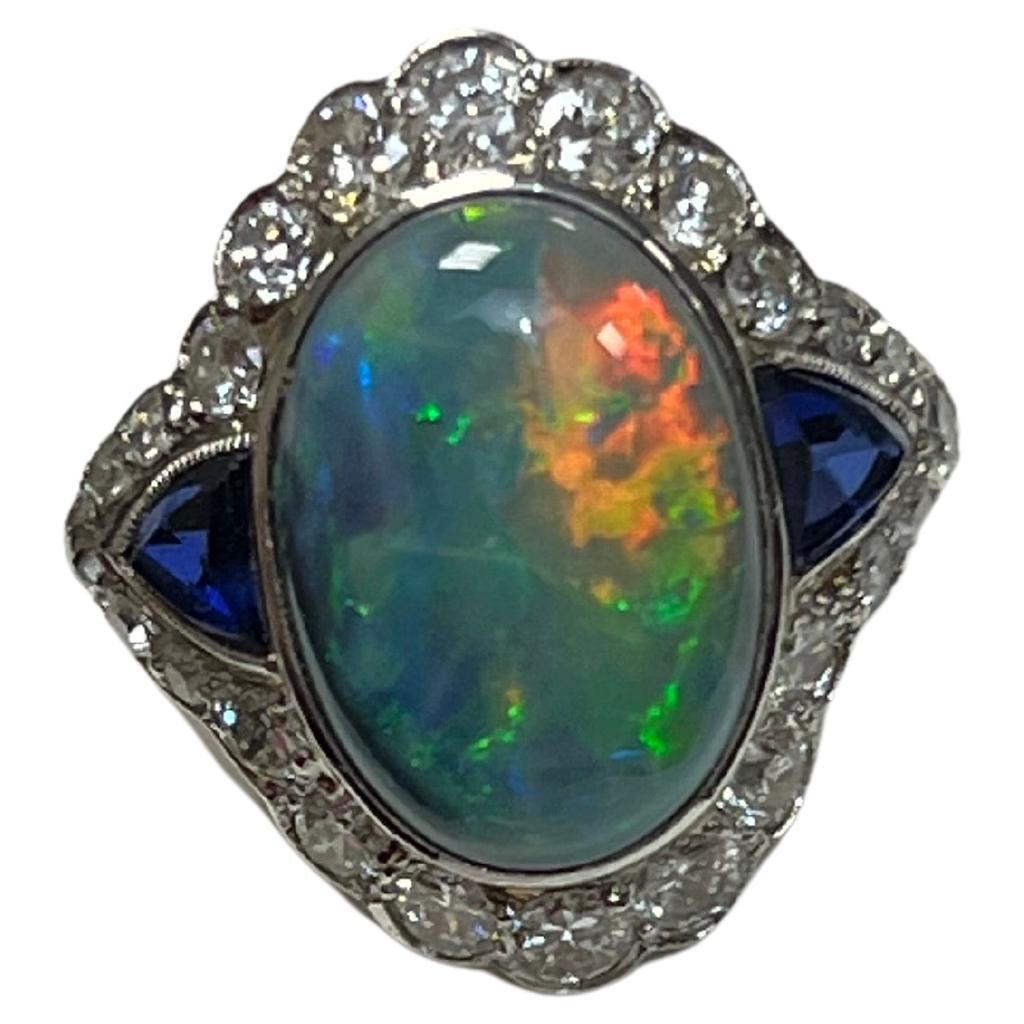 Lady's Black Opal, Blue Sapphire and Diamonds Ring in Platinum  For Sale