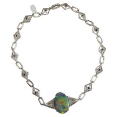 Retro Lady's Black Opal, Diamonds and Blue Sapphire and Necklace in Platinum 