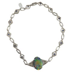 Lady's Black Opal, Diamonds and Blue Sapphire and Necklace in Platinum