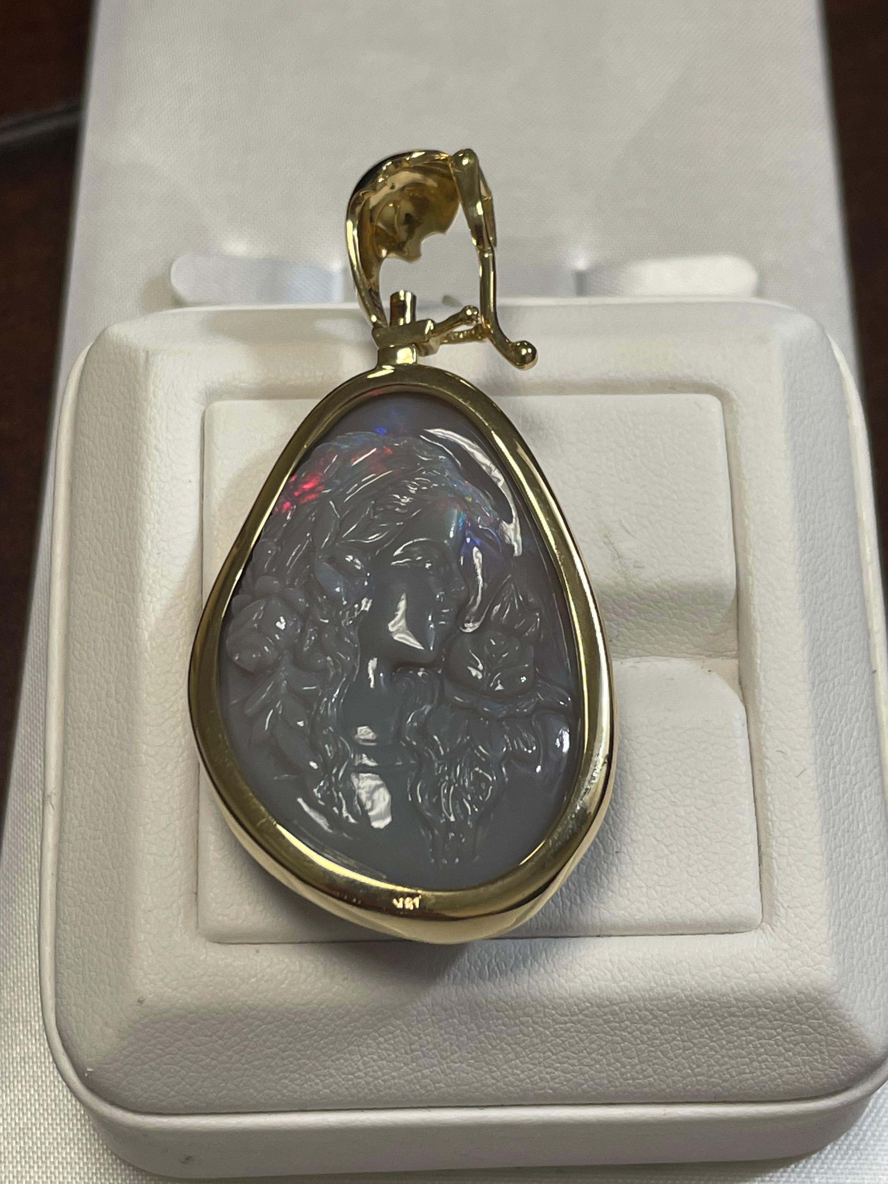 Lady's Black Opal Madonna and Child Carving Pendant in 18k Yellow Gold In Good Condition For Sale In New York, NY