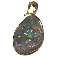 Lady's Black Opal Madonna and Child Carving Pendant in 18k Yellow Gold 