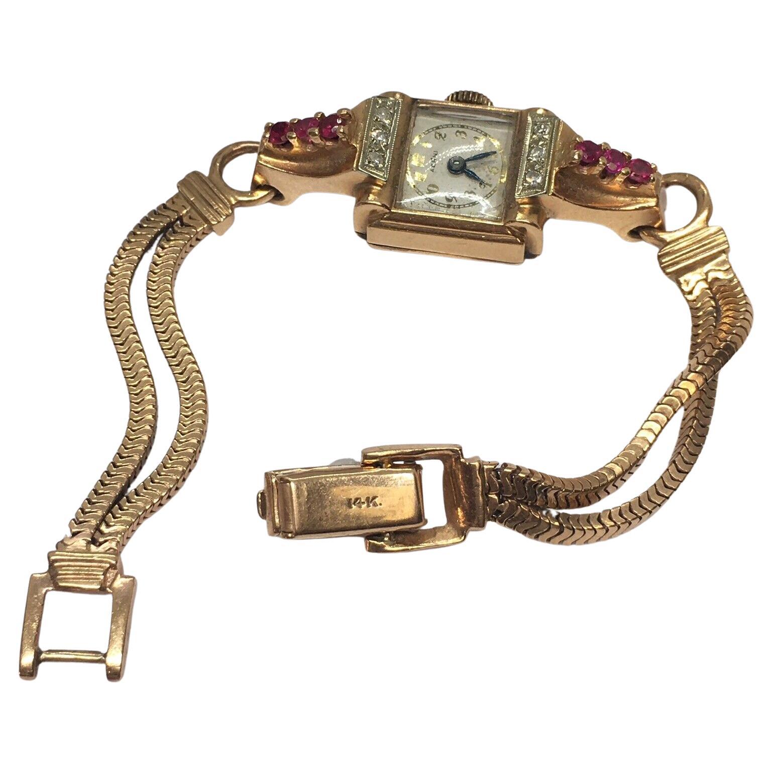Charles Areni Montre mécanique rétro en or rose 14 carats avec rubis et diamants, pour femmes, années 1940 en vente