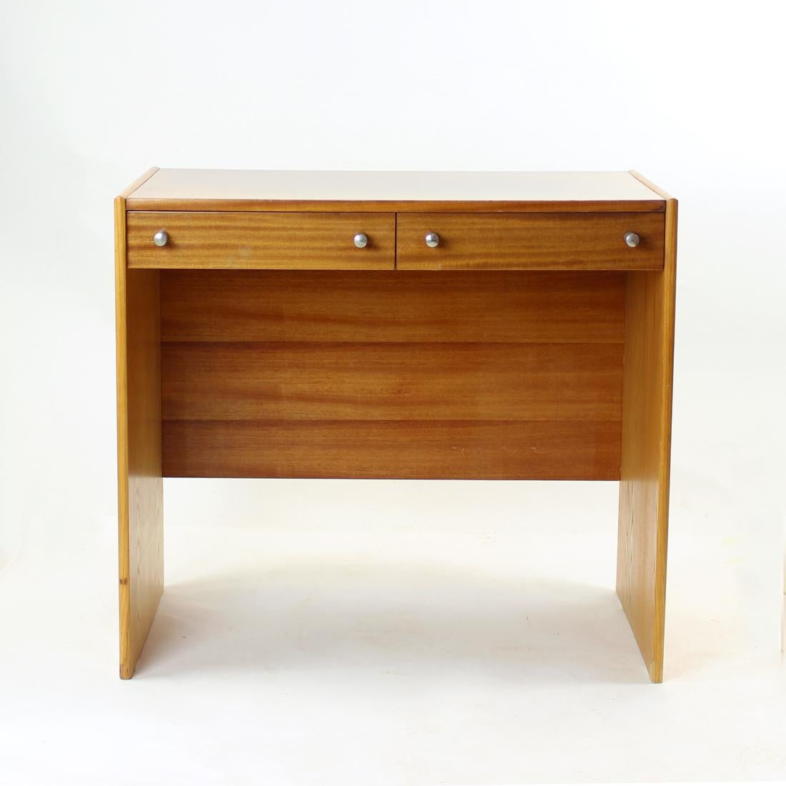 Beautiful midcentury desk, originally used as a desk for a lady, or vanity in the bedroom. The table is elegant combination of lighter birch wood on the sides and mahogany wood on top and faces of the drawers and desk. Beautiful and very strong