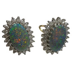 Lady's Opal and Diamonds Earrings in 14k Yellow Gold