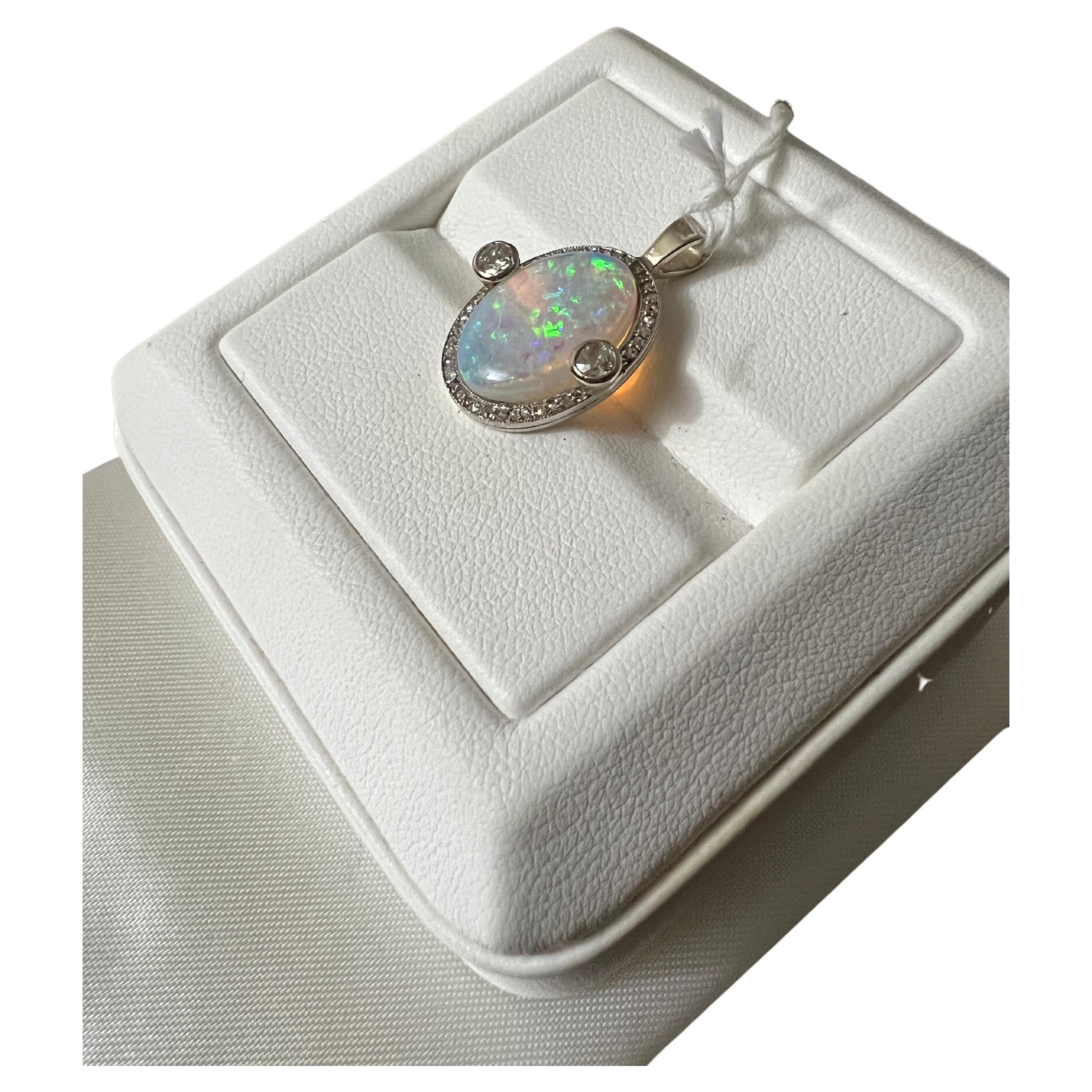 Lady's Opal and Pendant in 14k White Gold For Sale