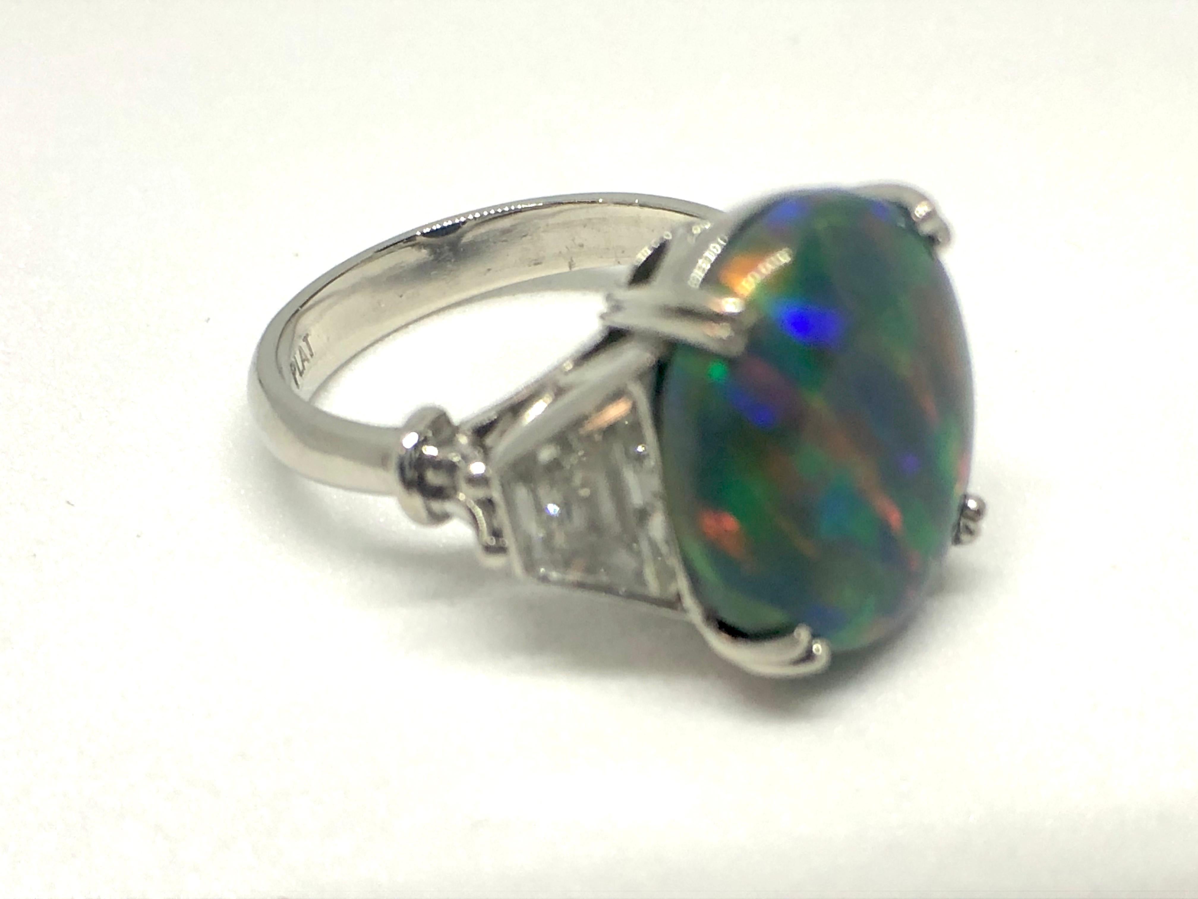 Contemporary Ladies Platinum Vibrant Black Opal and Diamond Ring