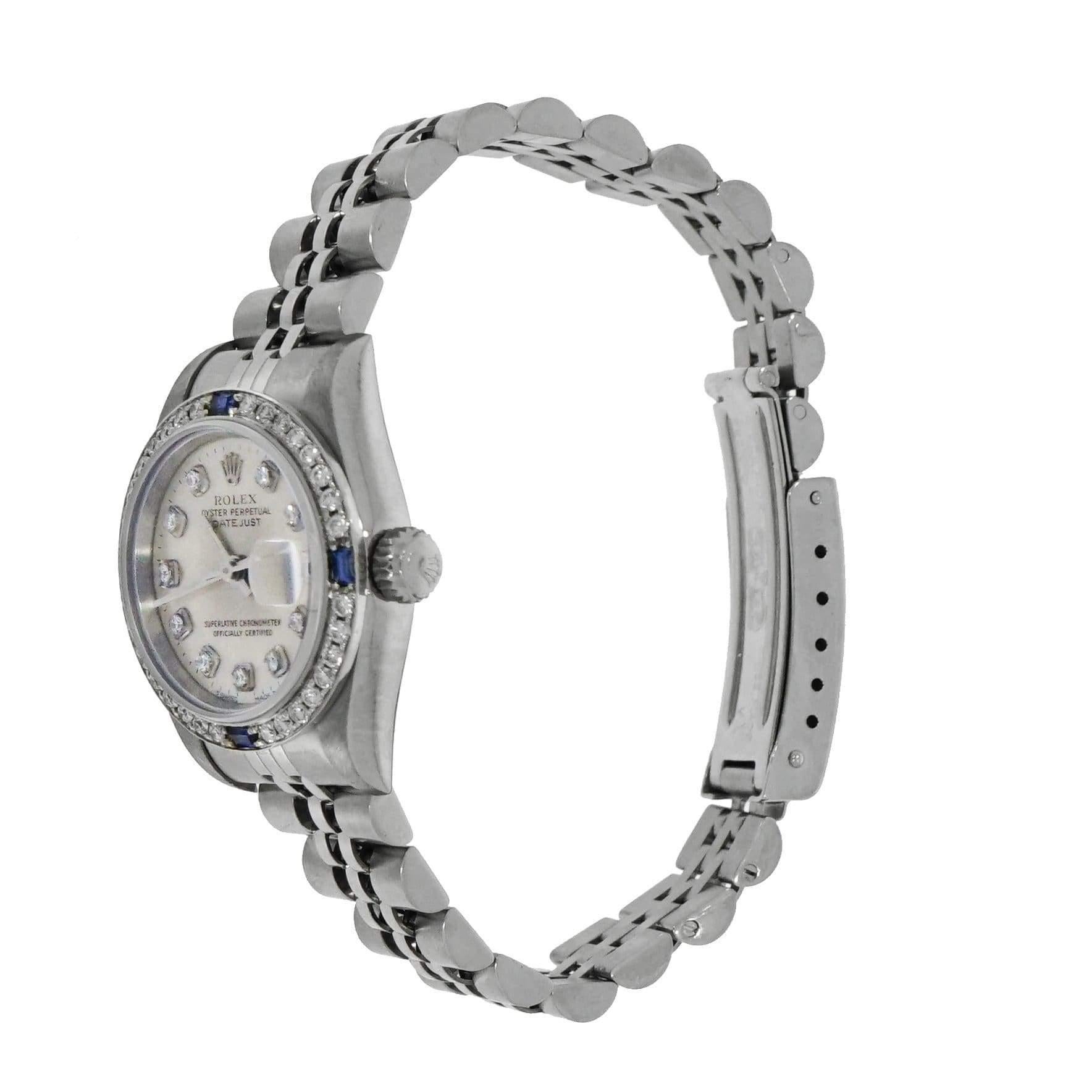 Excellent Lady’s Rolex Datejust 26 mm stainless steel, automatic movement, silver diamond dial, after market diamond bezel with 4 sapphires at 12 ,3,6 and 9 o’clock, sapphire crystal, date at 3 o’clock, jubilee bracelet. This watch has original box