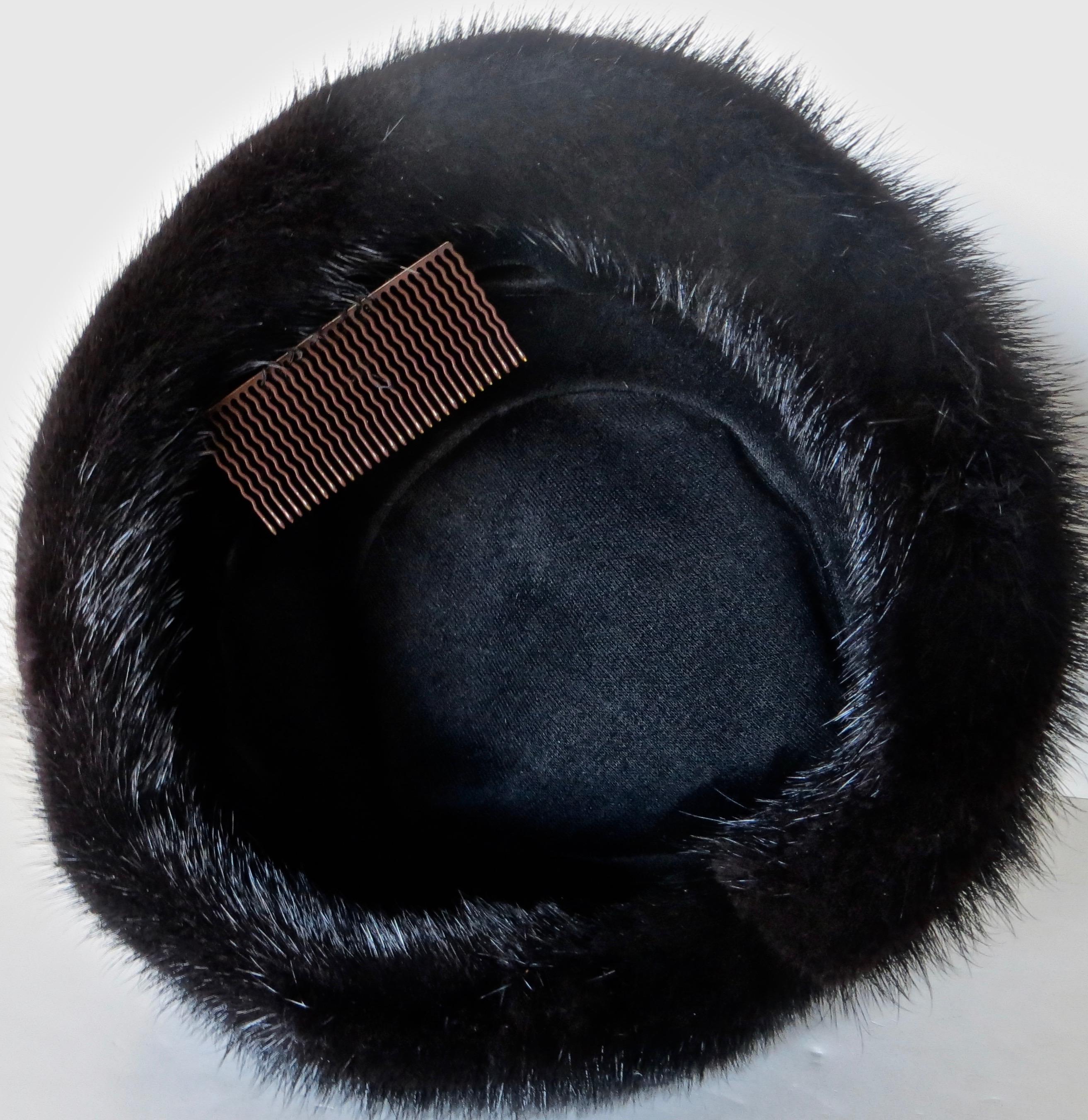 Well made black mink hat designed and sold by I. Magnin & Company in the mid 1960's. The style, undoubtedly worn and made popular by Julie Christie in the movie 
