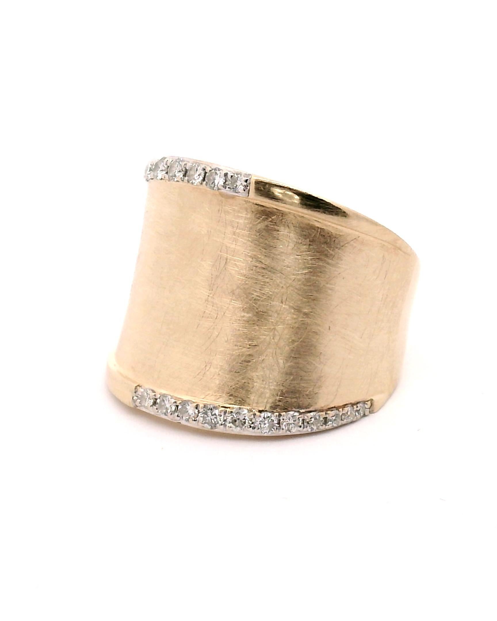 Lady's yellow gold tapered band with 22 round diamonds 

Diamond weight approximately .30cttw. 

Clarity grade VS1

Color Grade H

14k yellow gold 
8.4 grams 