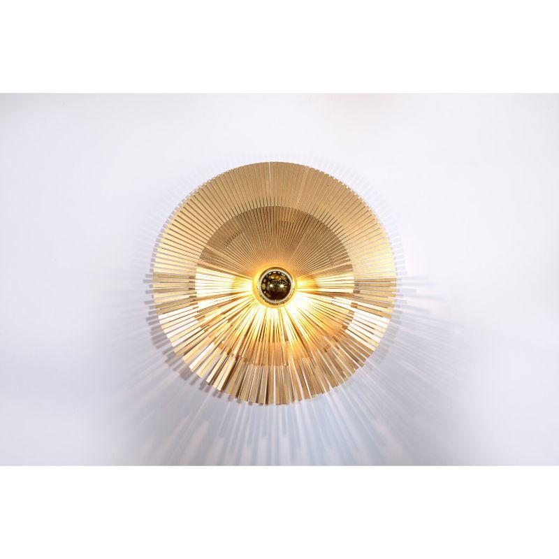 Lafayette wall lamp, large by RADAR
Design: Bastien Taillard
Materials: Brass, with LED base and brass bulb cover or with E27 base and visible bulb.
Dimensions: diameter 60 cm

Also available: D 40 cm in wall lamp version and chandelier
