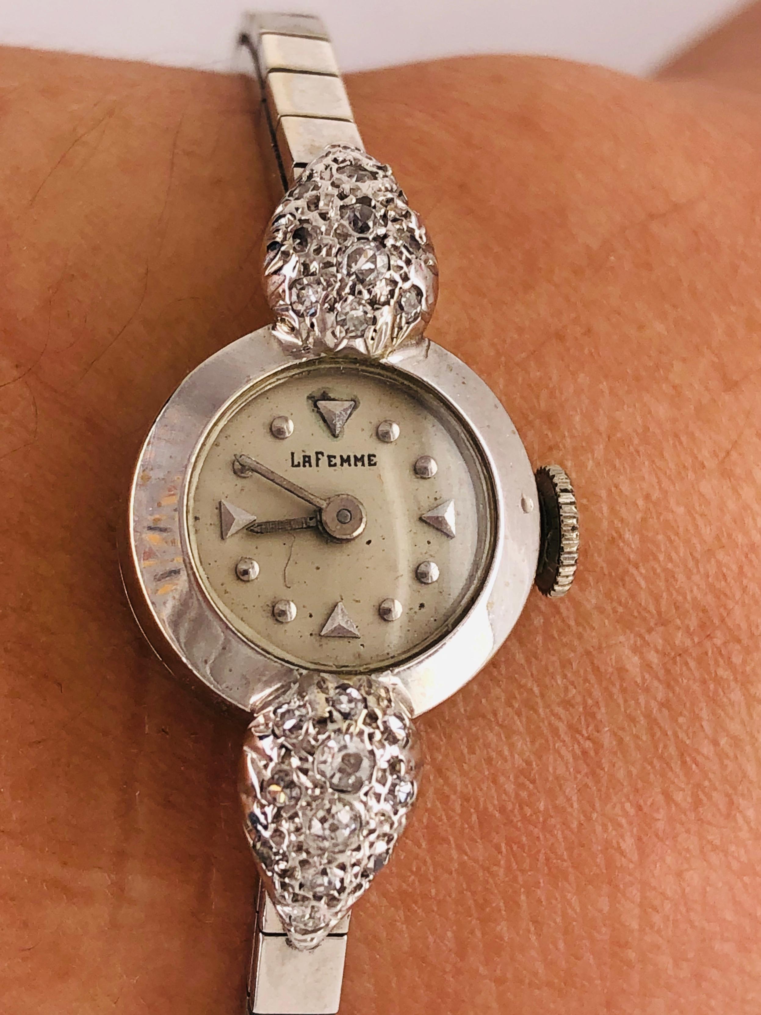 Nice petite vintage ladies watch by La Femme 14 Karat Ladies Watch 22 Total Diamonds.

