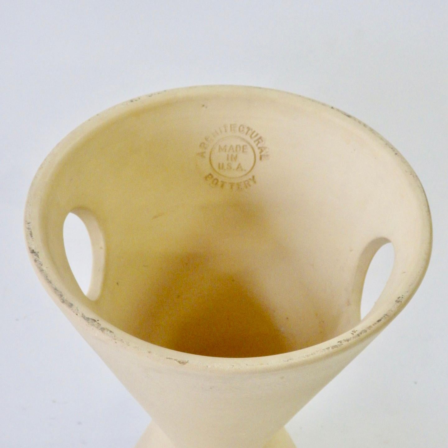 Nice clear architectural pottery stamp on this early Lagardo Tackett double cone planter pot. Unglazed bisque finish.