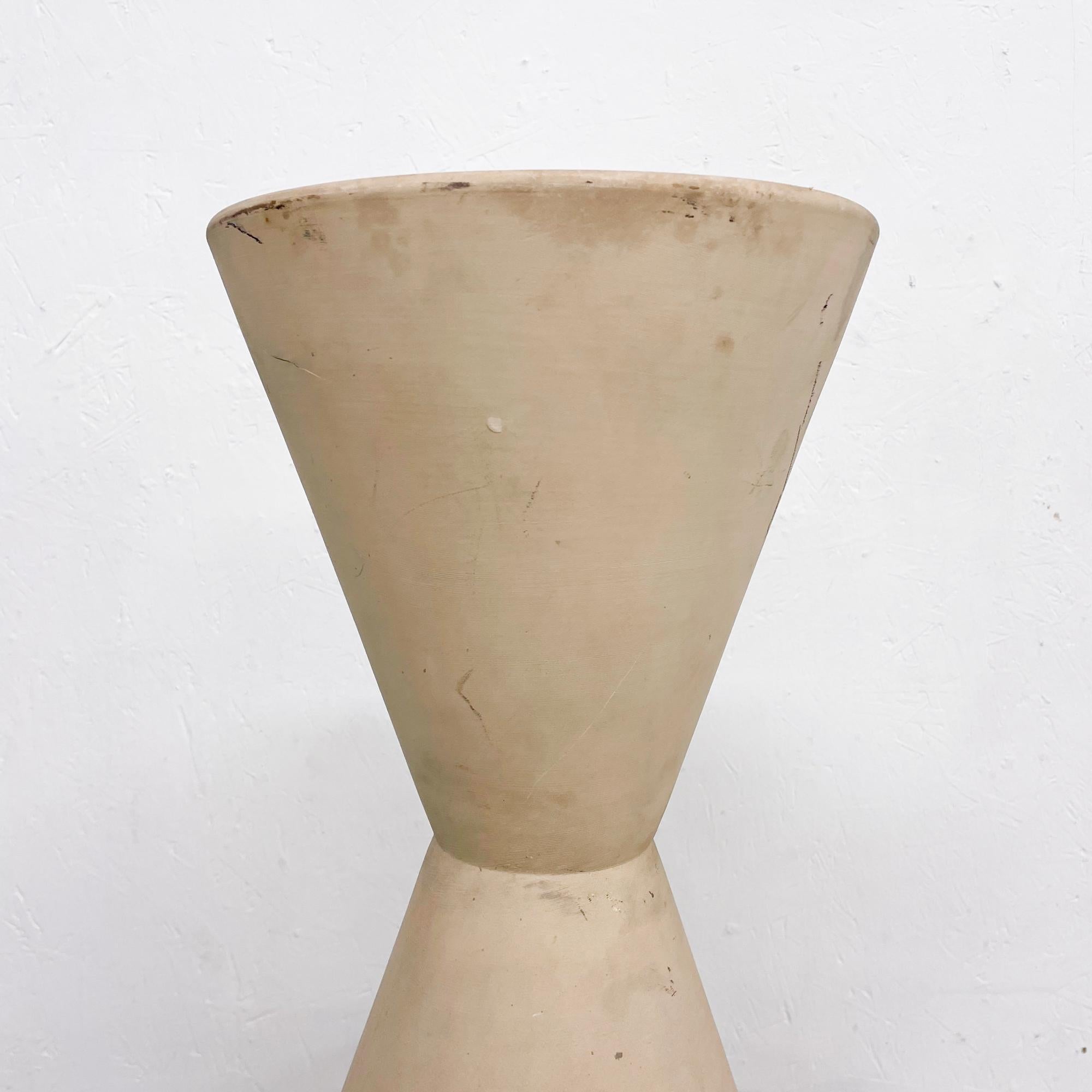 MCM Classic Pottery by designer LaGardo Tackett sculptural bisque double cone hourglass planter for Architectural Pottery U.S.A. 
Modernist trademark of simplicity, sensibility and minimalism.
Stamped by maker. 
Architectural Pottery represents the