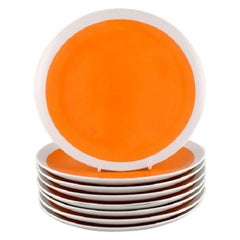 Lagardo Tackett for Schmid, Eight Plates in Porcelain, Beautiful Orange Glaze