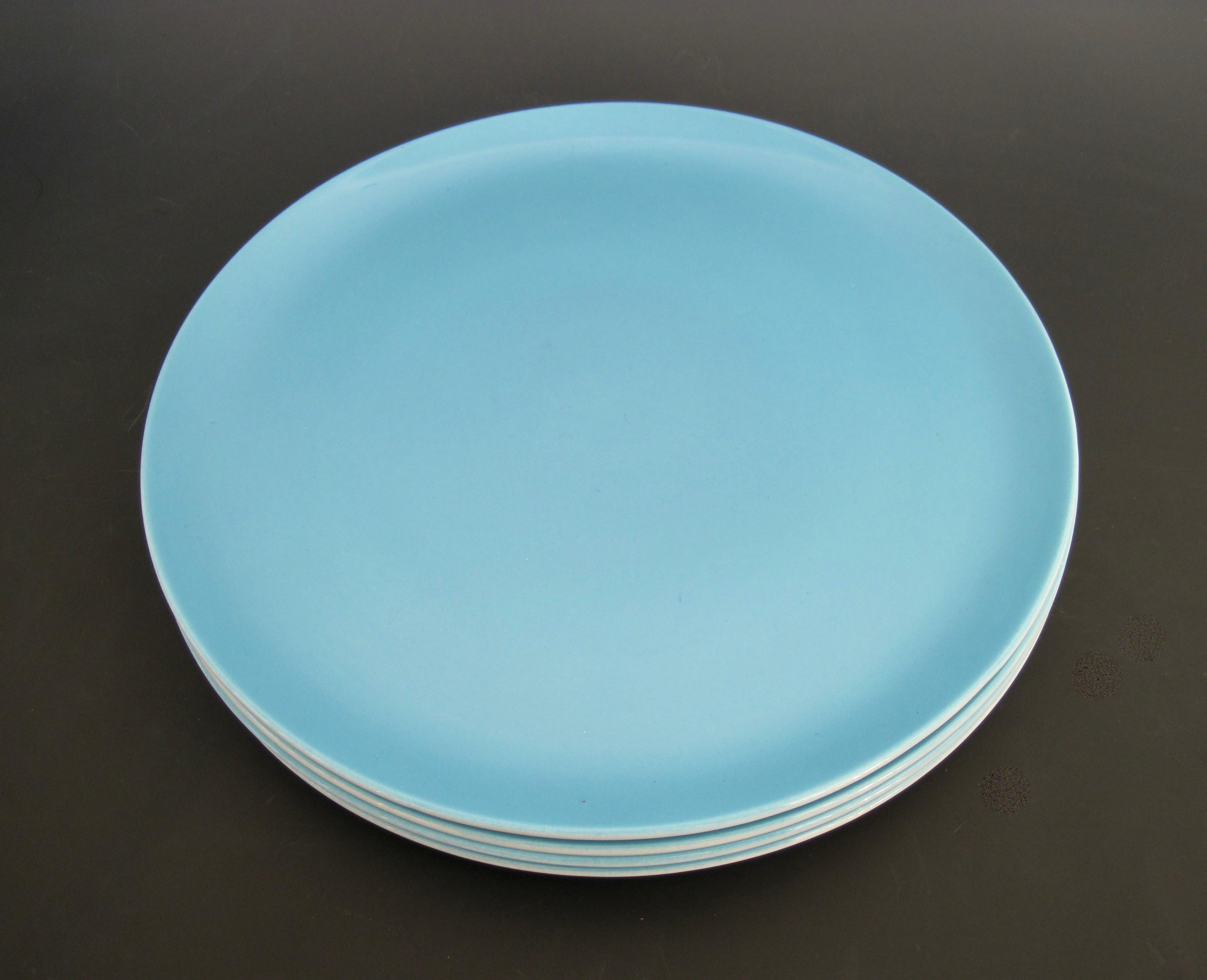 A four piece set of ovenproof ironstone dinner plates designed by Lagardo Tackett for Schmid in 1961. Perfect to add to your collection and the beautiful blue glaze is sure to brighten up any table at breakfast or anytime. Wonderful condition made
