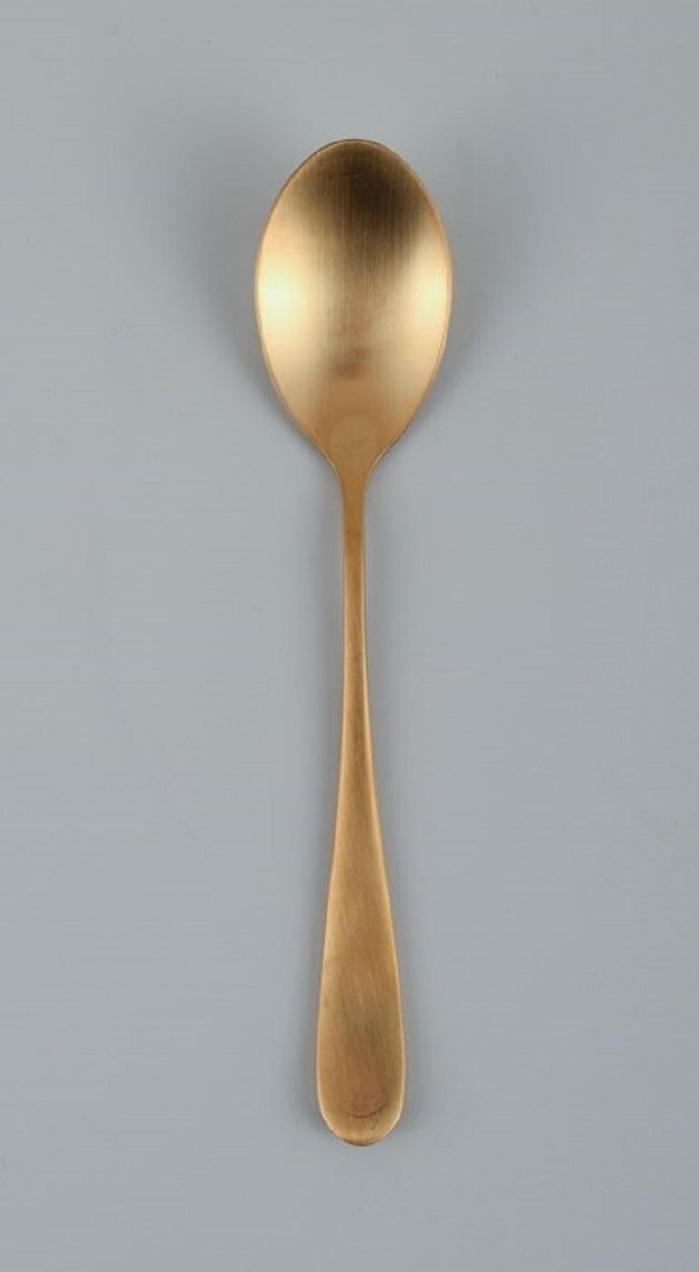 Contemporary Lagerhaus, Sweden. Dinner Service in Brushed Brass for Twelve People For Sale