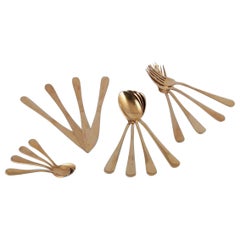Lagerhaus, Sweden. Dinner set in brushed brass for four people. 21st C.