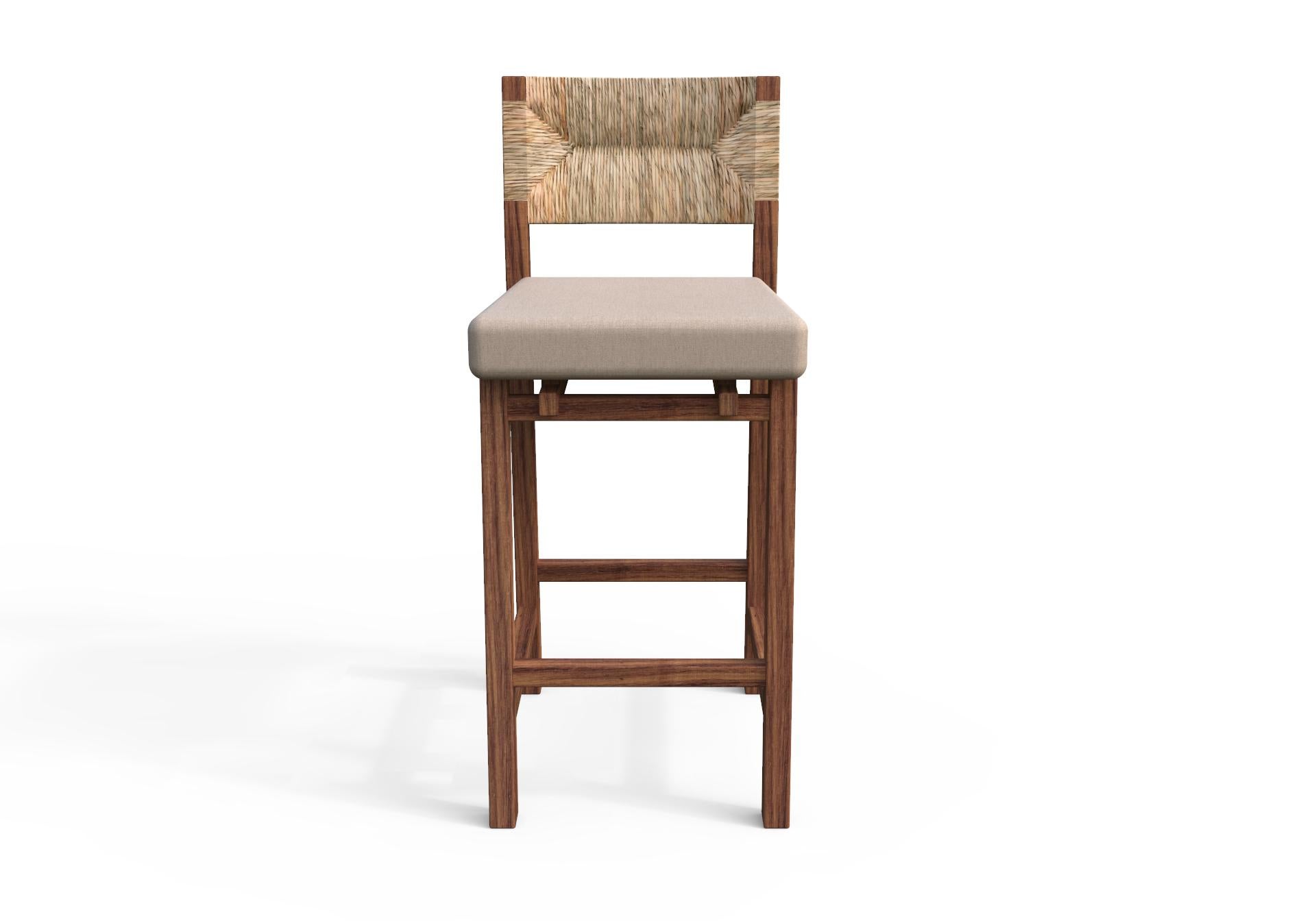 This classic design has a modern flourish without overshadowing the handcrafted details from the Natural Palm woven back that makes it so unique. The Lago barstool is made of solid Huanacaxtle, a tropical hardwood from southern Mexico. The cushion