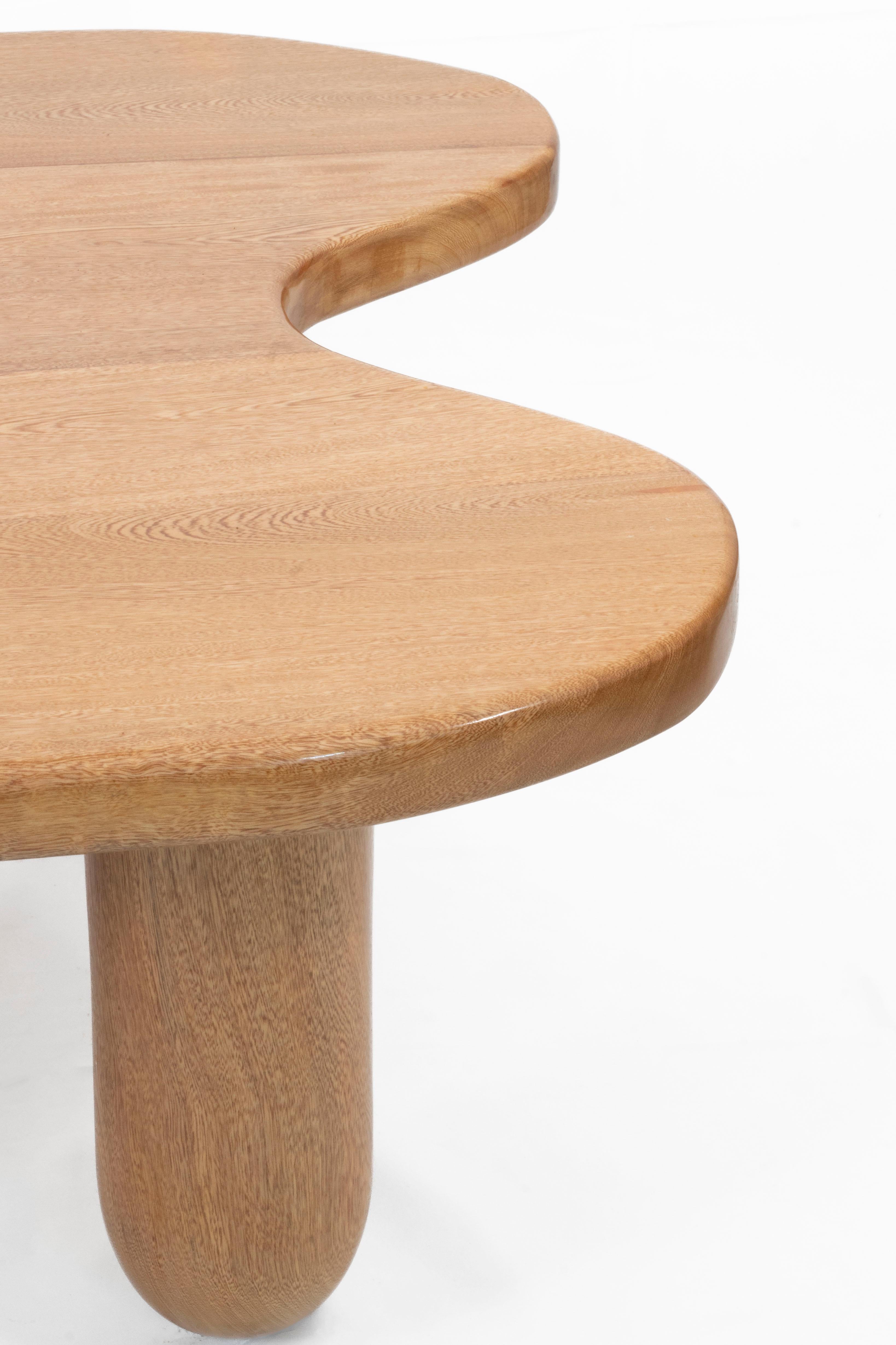 Turned Lago Table in solid Mexican Oak; organic shapes; a contemporary coffee table. For Sale