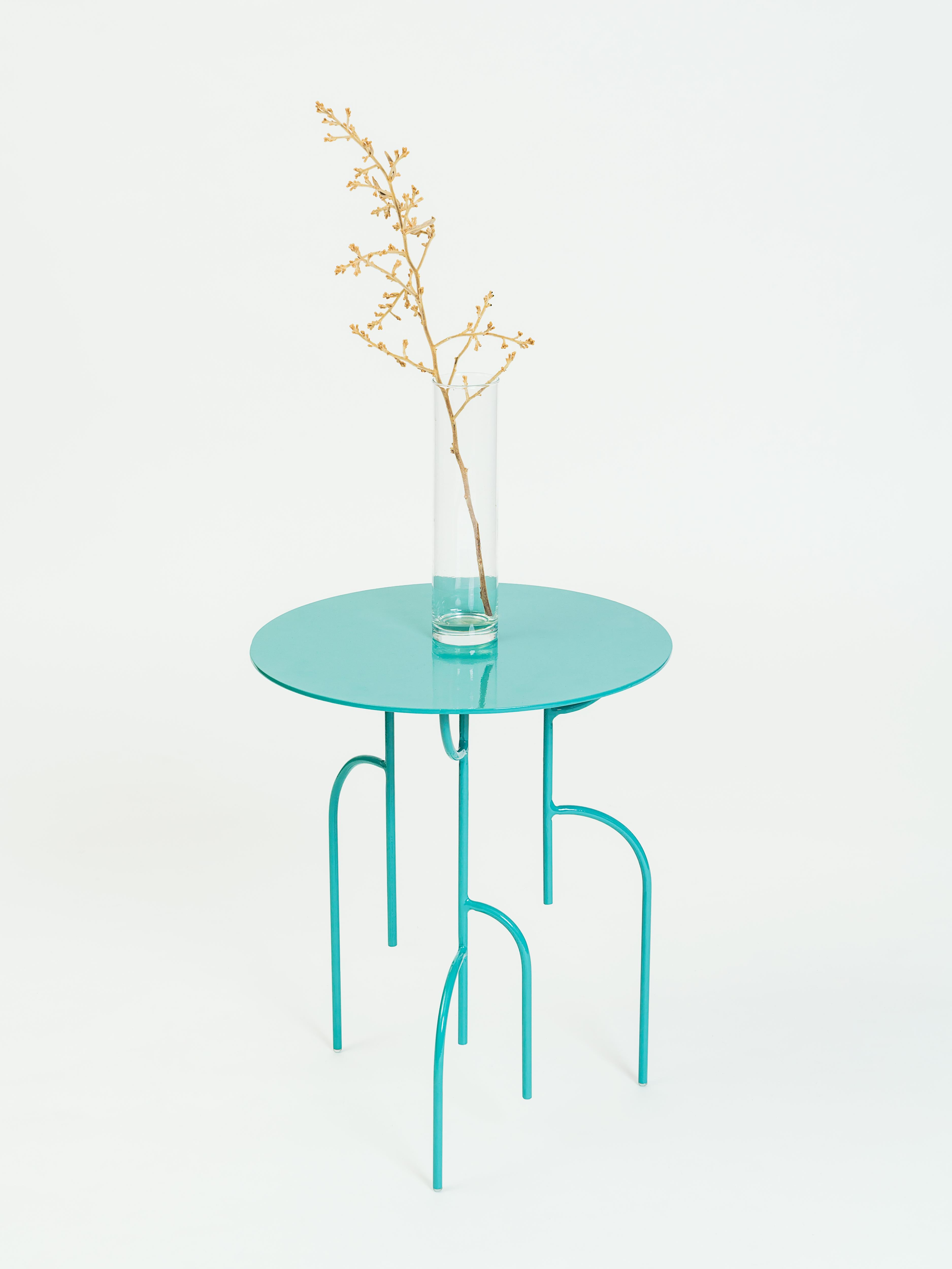 The Lagoas tables and lamp are inspired by the nature, it is an allusion to the mangrove trees and the way it deeps into the water.

The legs design plays with the senses of the observer by distorting the perspective and sense of distance. It is