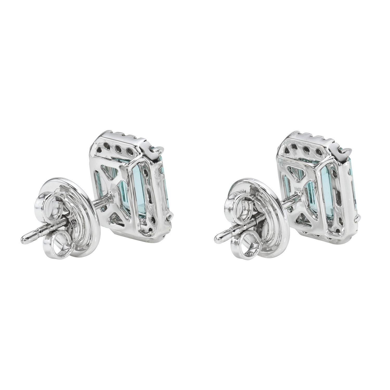 Mesmerizing pair of 2.95 carat Lagoon Blue Tourmaline Emerald Cut, 18K white gold earrings, decorated with a total of 0.32 carat collection round brilliant diamonds and 0.26 carat baguette diamonds.
Returns are accepted and paid by us within 7 days
