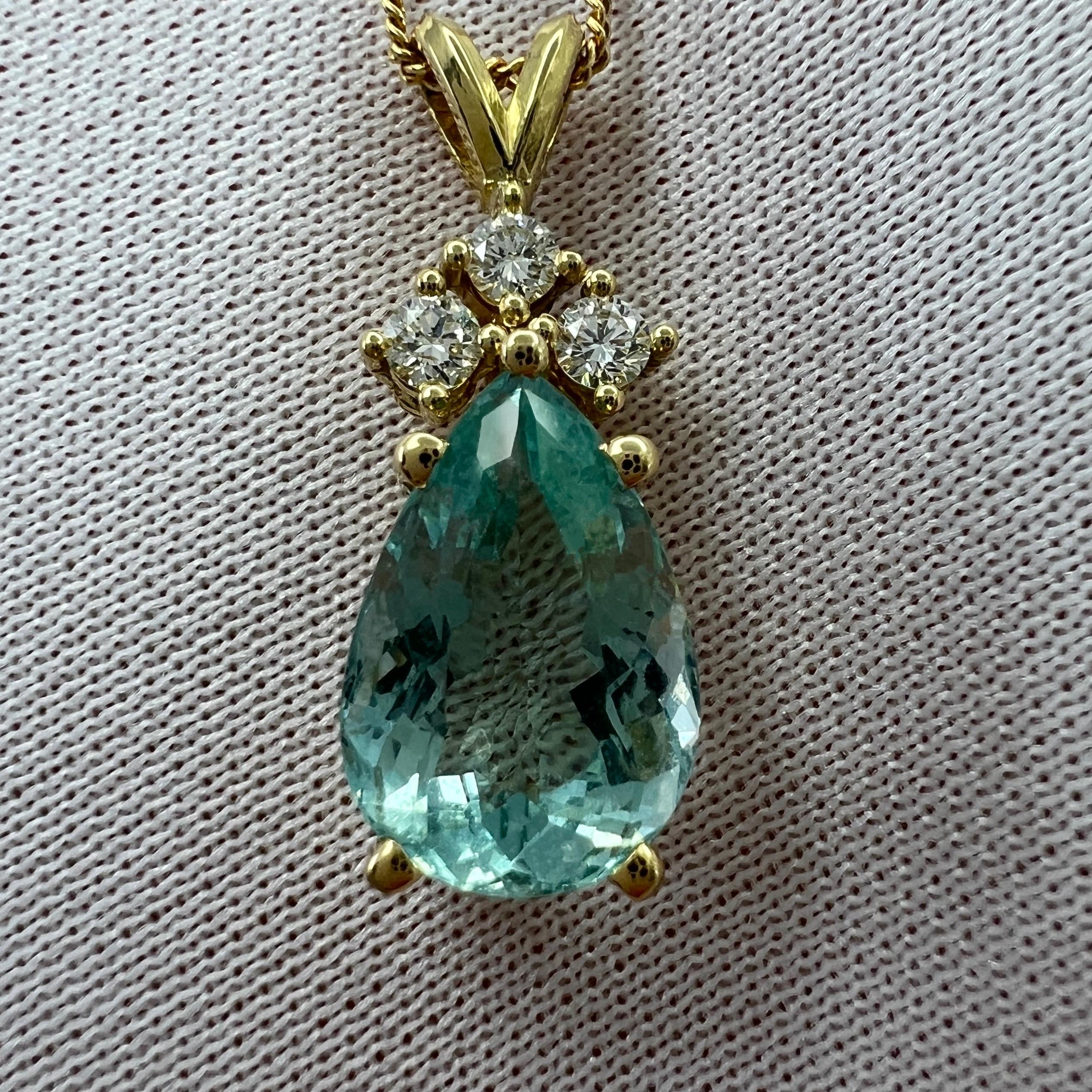 Natural 'Lagoon' Green Blue Aquamarine And Diamond 18k Yellow Gold Pendant Necklace.

3.30 Carat aquamarine with a stunning vivid 'lagoon' green blue colour and an excellent pear teardrop cut showing lots of brightness and light return. Also has