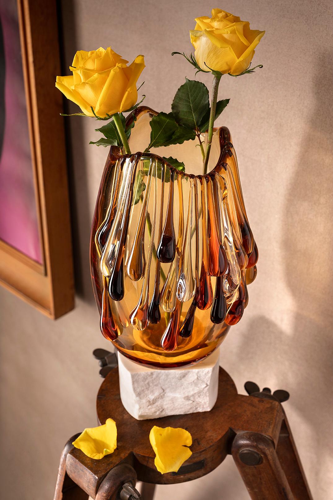 Lagoon' Tears Murano Glass Vase by Aina Kari
One Of A Kind.
Dimensions: D 18 x H 30 cm. 
Materials: Murano glass, marble.

Aina Kari
After working for different world-renowned brands in Italy and abroad, Marina Cighir embarked on a new project for