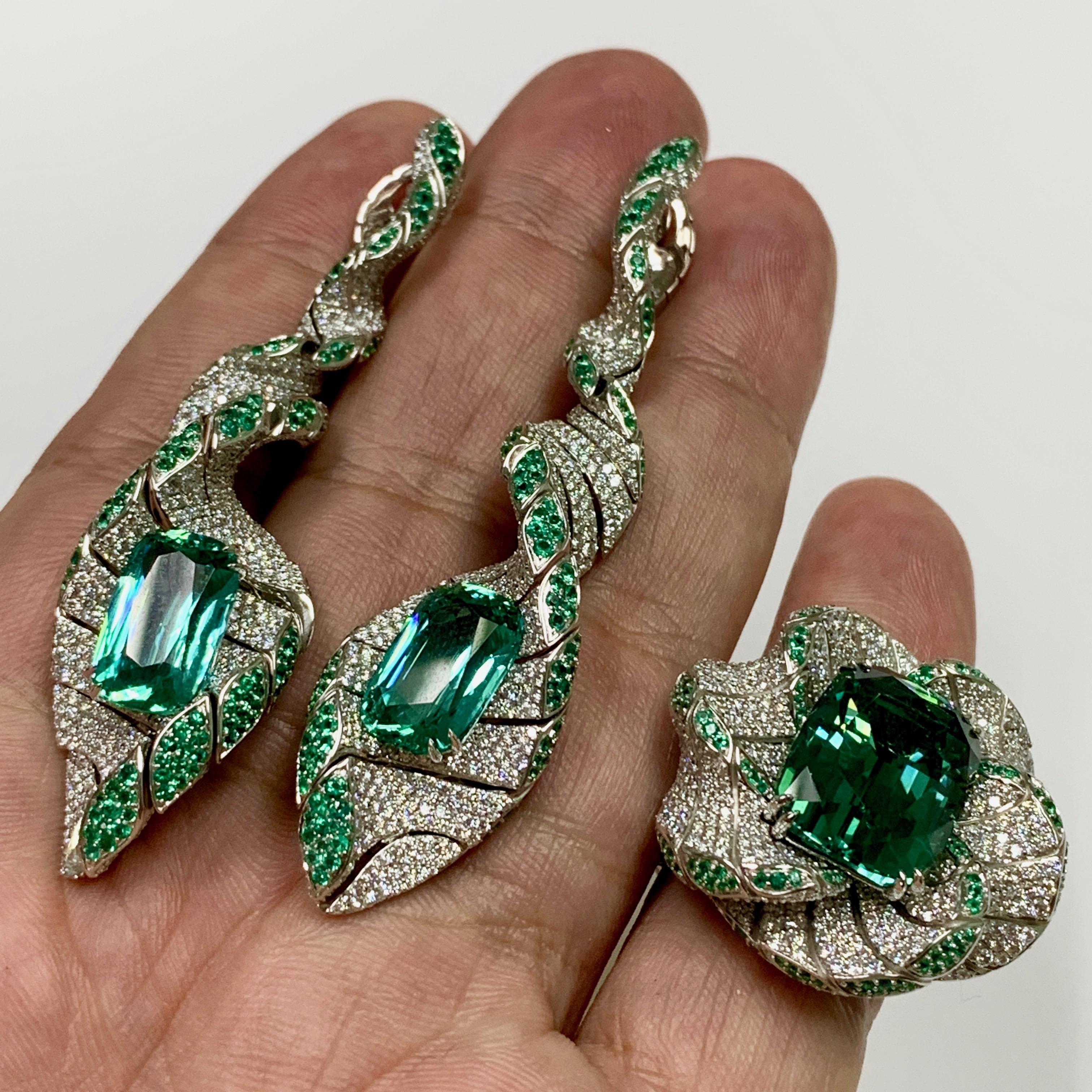 Tourmaline Diamonds Emeralds 18 Karat White Gold DNA Suite
In the shape of this Suite, you probably already guessed that when they were created, our designers were inspired by the structure of human DNA. What could be more perfect? But not only the