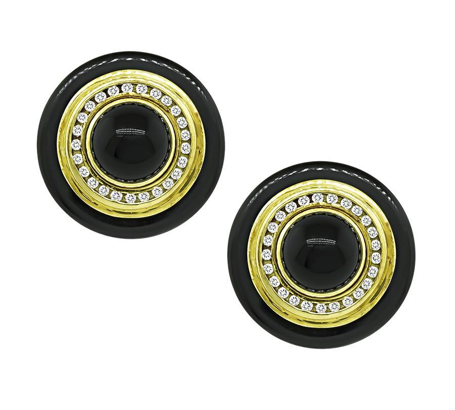 This is a gorgeous pair of 18k yellow gold earrings by Lagos. The earrings feature sparkling round cut diamonds that weigh approximately 1.50ct. The color of the diamonds is F with VS clarity. The diamonds are accentuated by lovely onyx accents. The