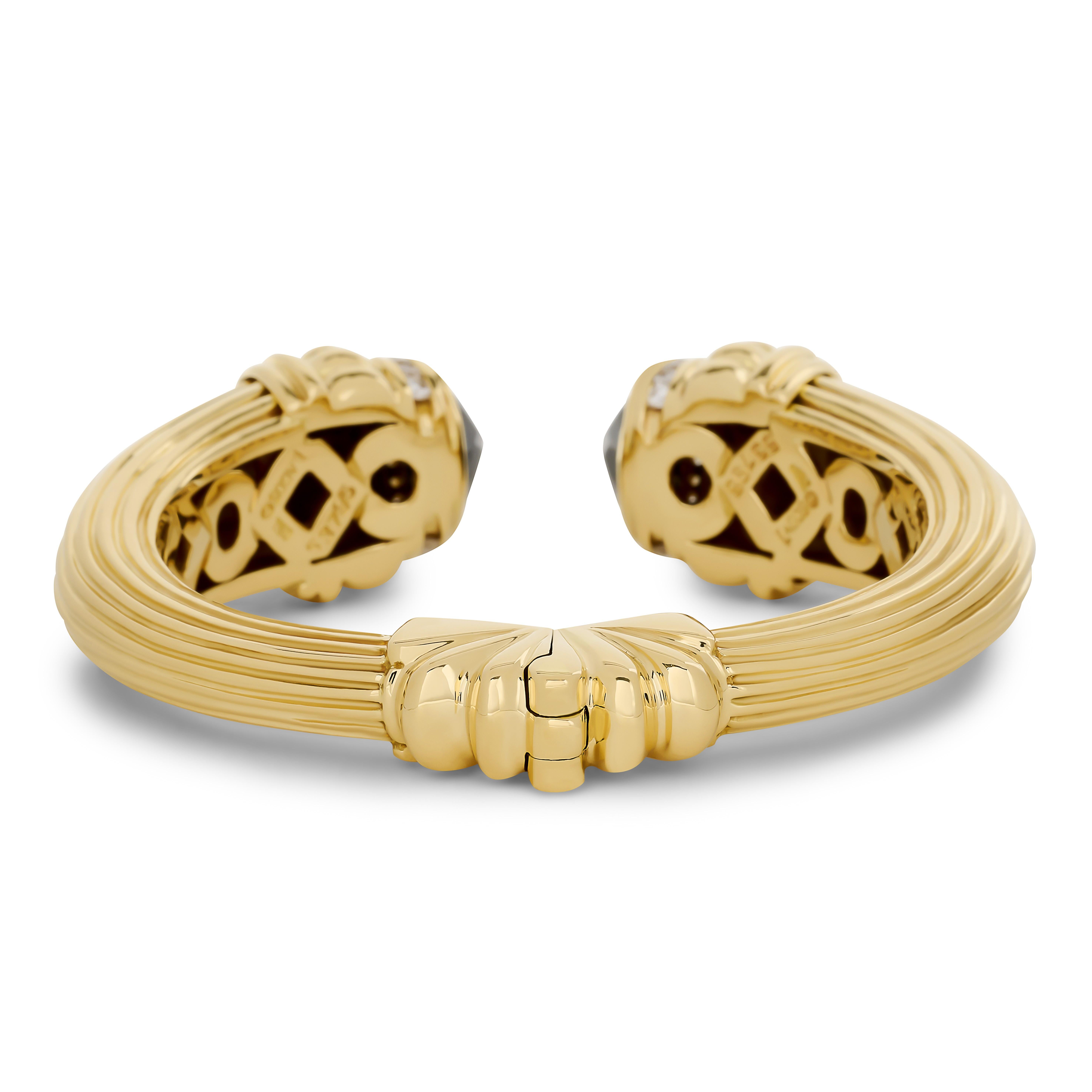 This Lagos bracelet features an open-cuff design crafted in ribbed gold, culminating in striking black onyx terminals accented by pavé-set diamonds on either side.

30 Round Diamonds that weigh approximately 0.90 carat. They are G-H color and VS-SI1