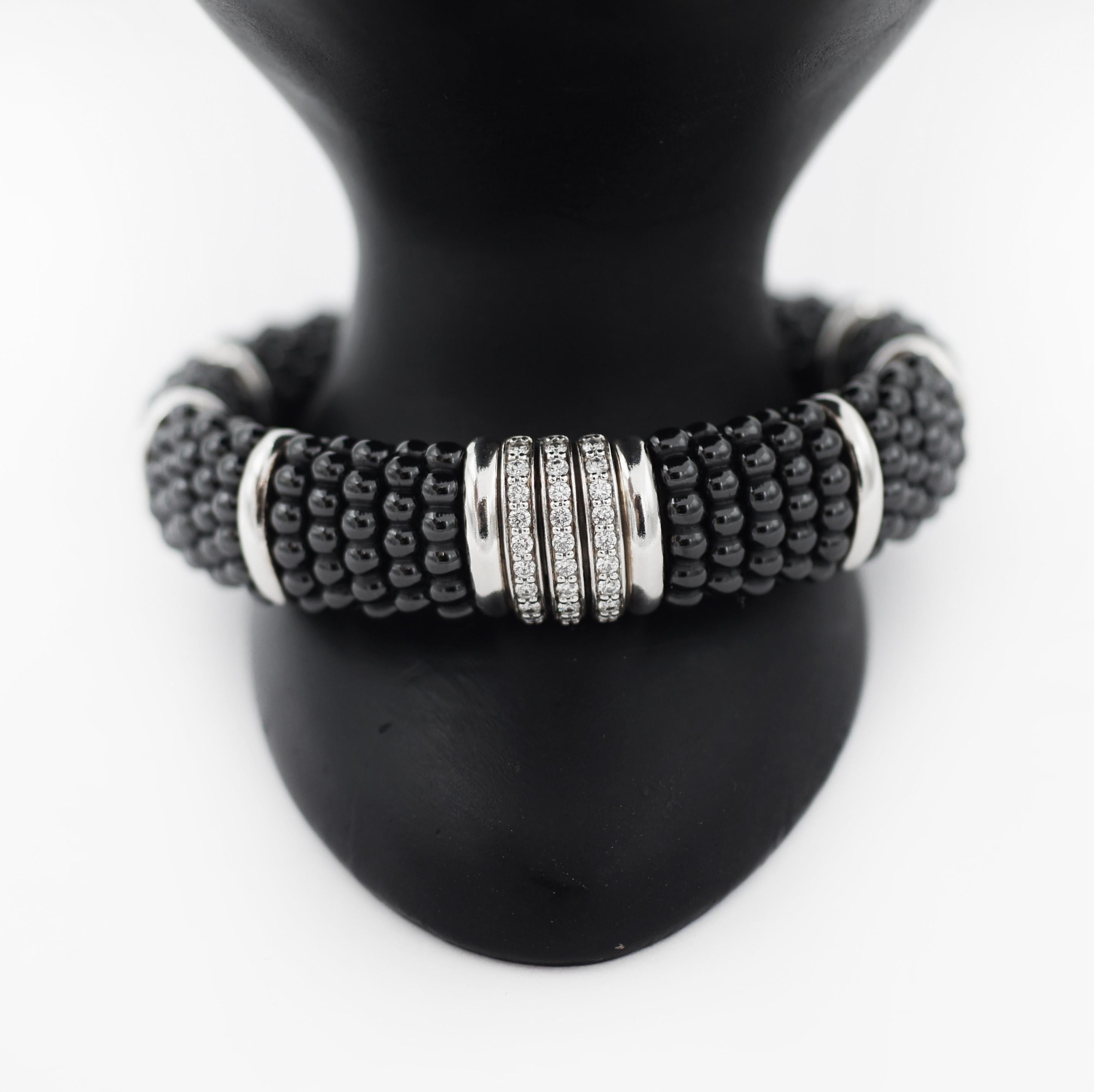 Beautiful Black Caviar diamond link bracelet by LAGOS.
Polished sterling silver and black ceramic make this bracelet stand out with accented and smooth station links and 3 white diamond pavé links.
Alternating links and Caviar beading.
Approximately