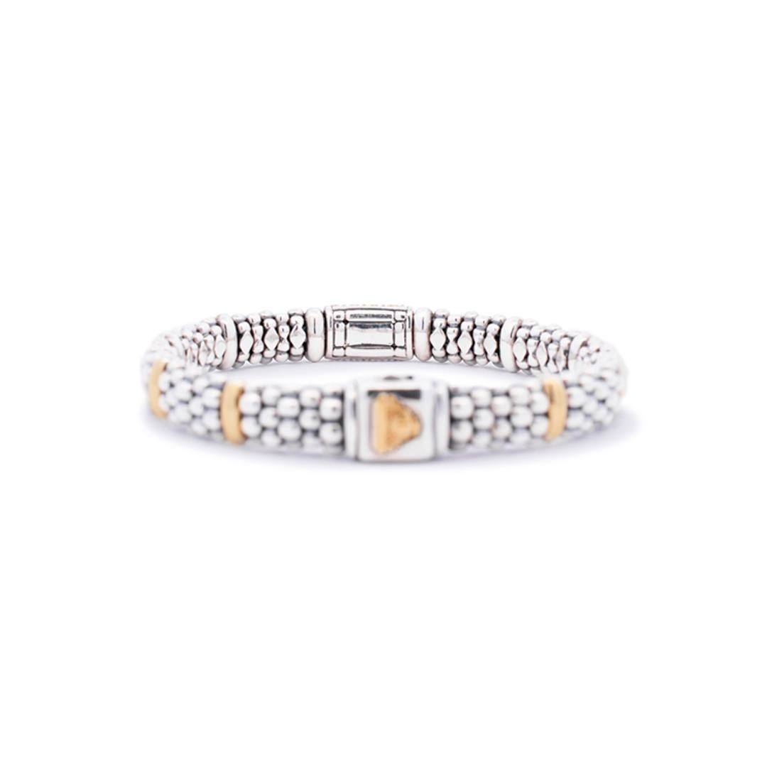 Geschlecht: Damen

MATERIAL: 925 Sterling Silber & 18K Gelbgold

Länge: 6,5 Zoll

Breite: 9 mm

Gesamtgewicht: 45,0 Gramm.

Graviert mit 