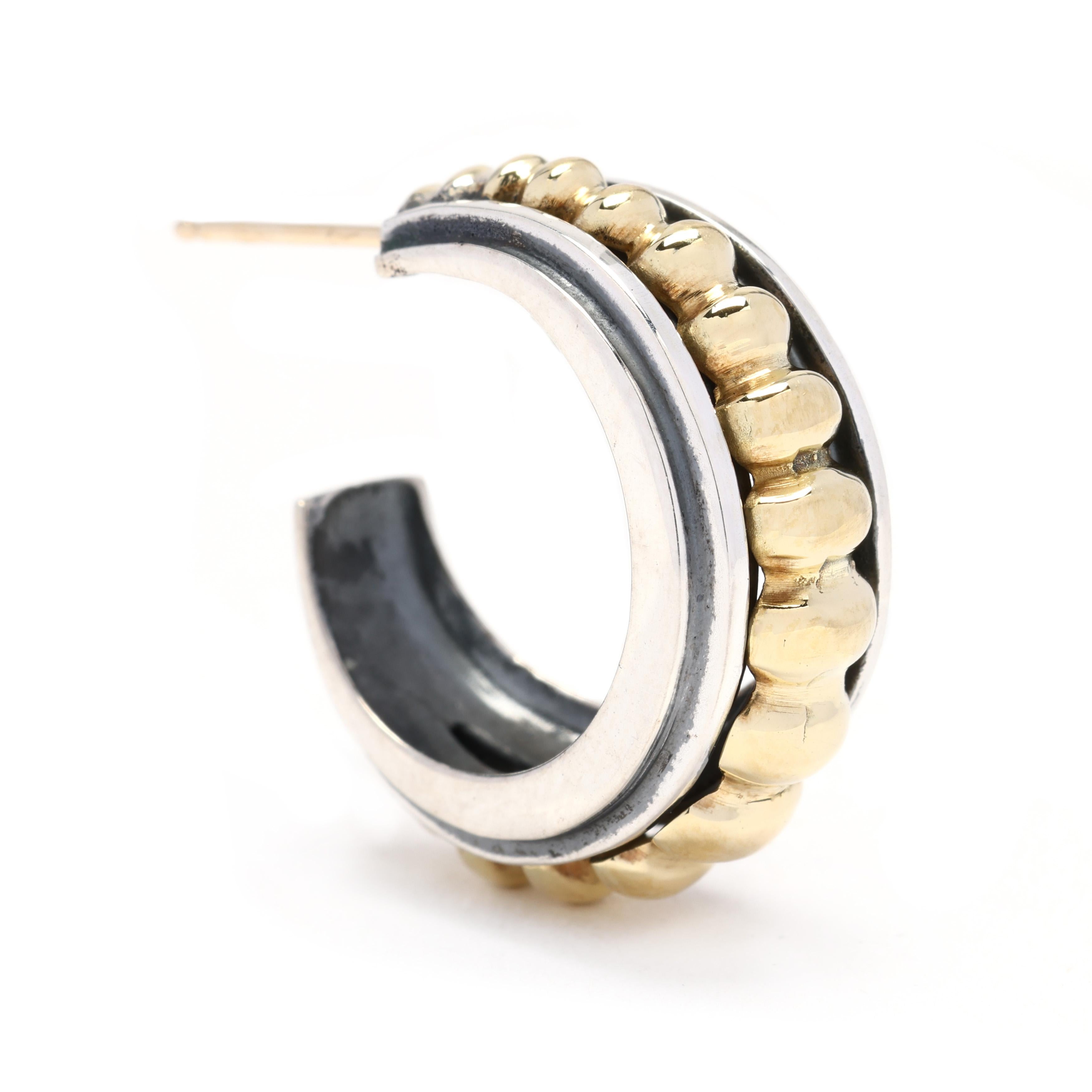 These Lagos Caviar ribbed hoops are a must-have addition to your jewelry collection. Made from sterling silver with an 18k yellow gold accent, these hoops are crafted with a thick and ribbed design that adds a unique and modern twist. The Lagos