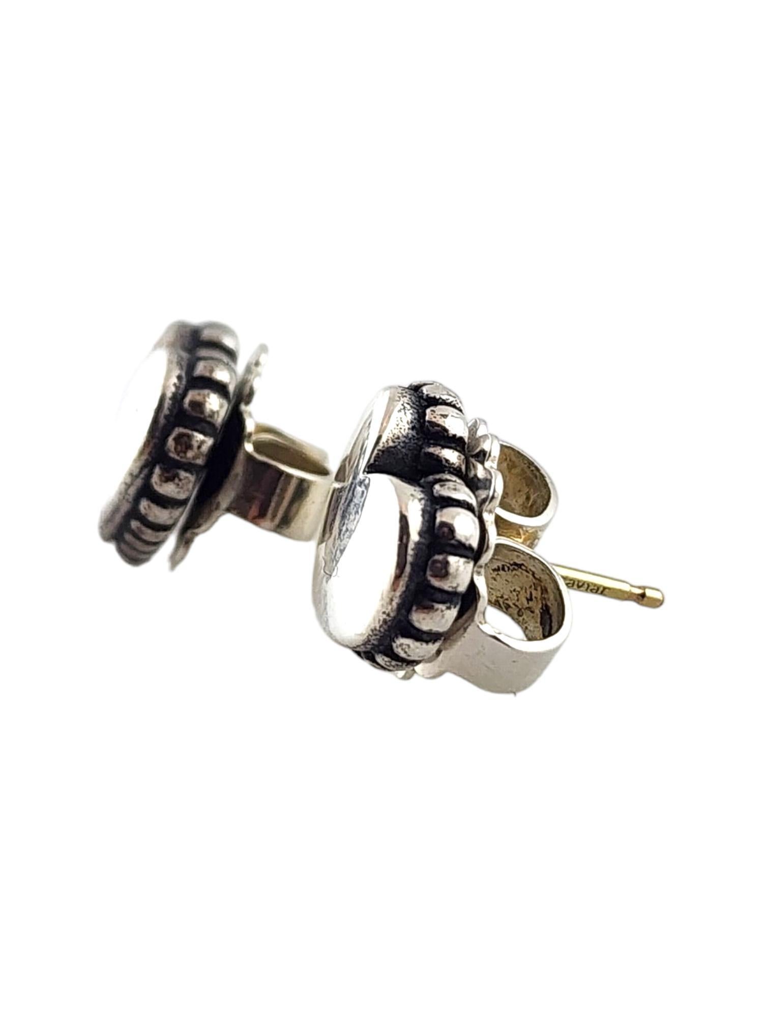 LAGOS Caviar Sterling Silver & 14K Yellow Gold Puffy Heart Stud Earrings

This gorgeous set of puffy heart studs were meticulously crafted from sterling silver with 14K yellow gold posts by designer Caviar!

Size: 9.51mm X 11.38mm X 3.42mm

Weight: