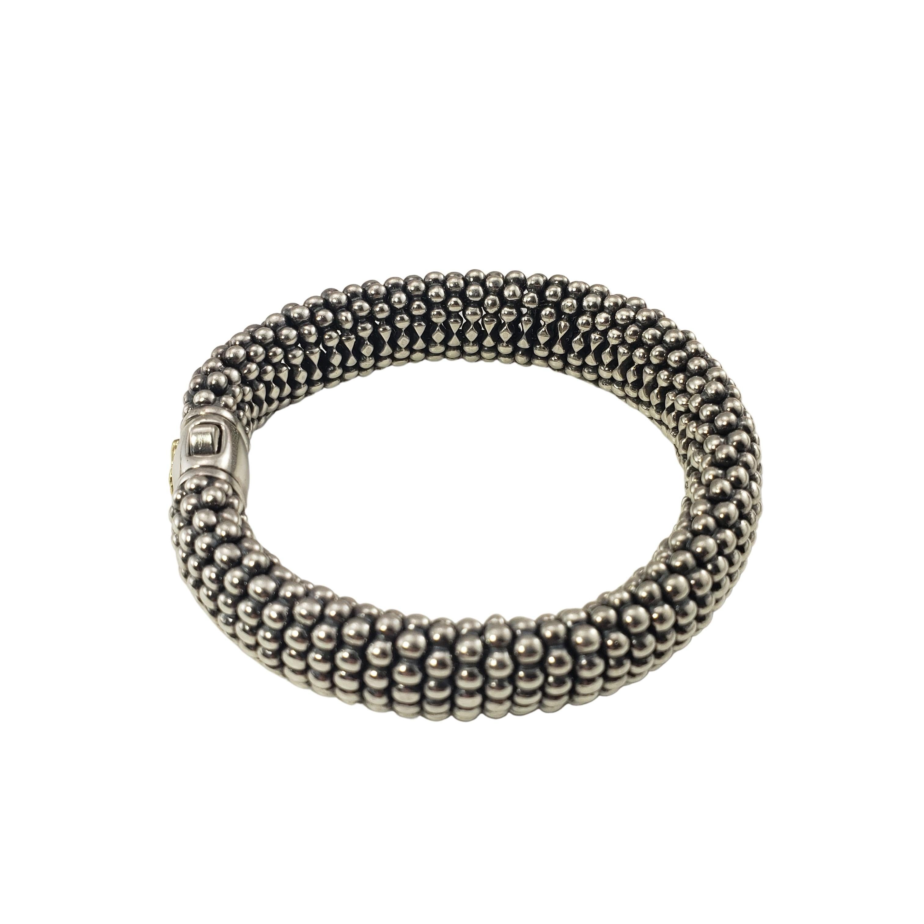 Lagos Caviar Sterling Silver and 18K Yellow Gold Beaded Bracelet-

This stunning beaded bracelet is crafted in beautifully sterling silver and accented with an 18K yellow gold emblem on closure.
Width:  14 mm.

Size: 7.75

Weight:  59.7 dwt. /  93.0