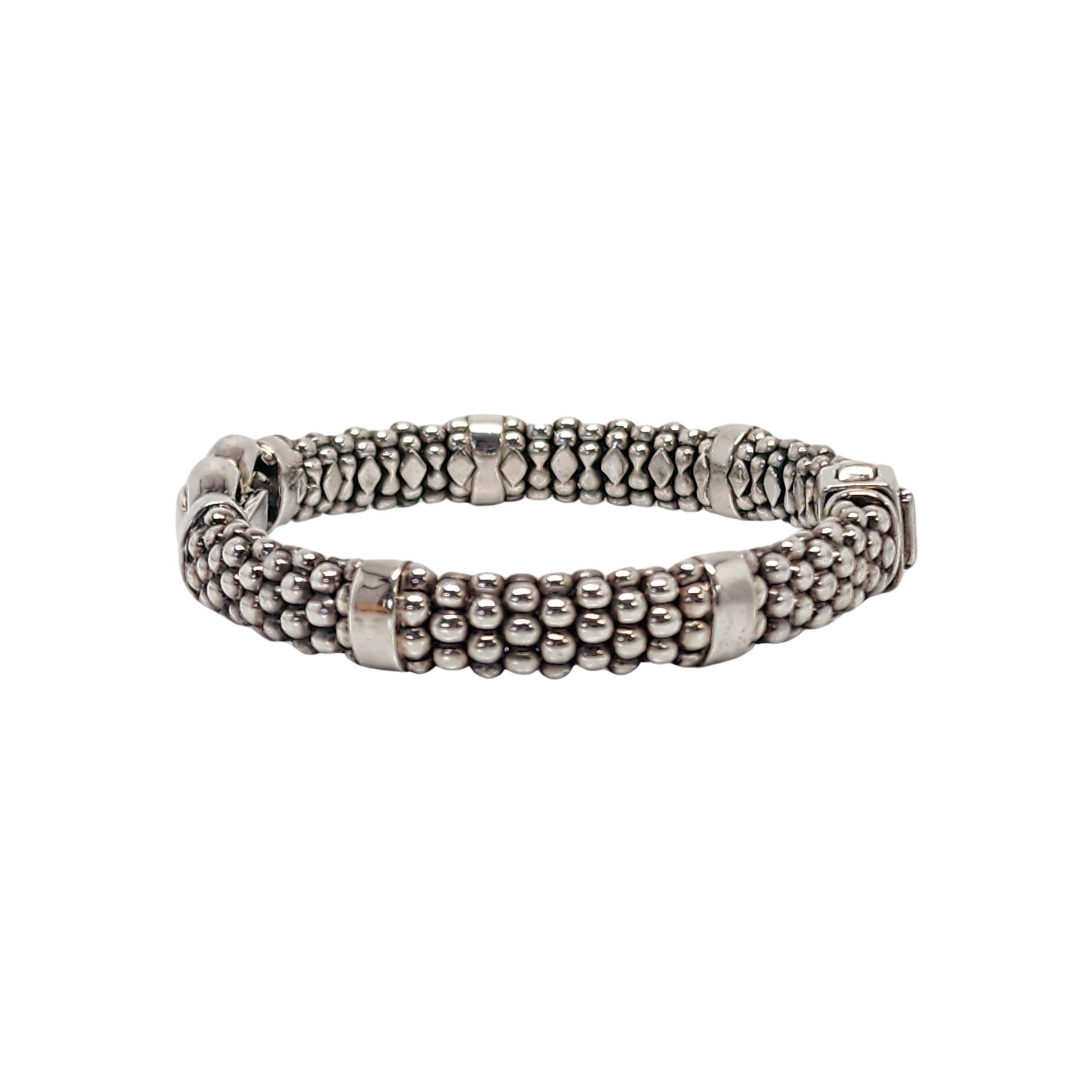 Lagos Caviar sterling silver Derby Buckle Bracelet.

Beautiful sterling silver caviar bracelet with double loop buckle at front. Push clasp closure.

Measures approx  6 3/4