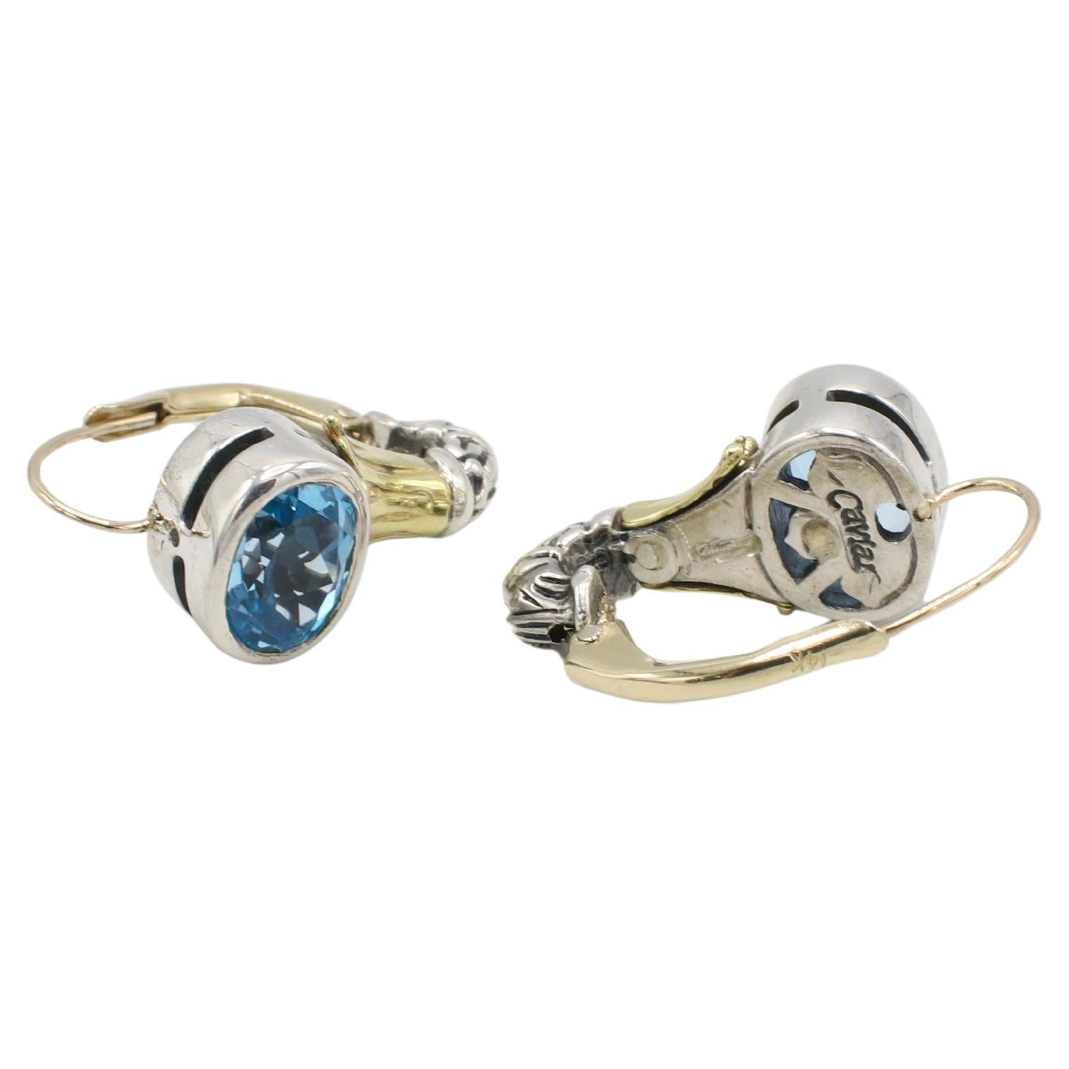Lagos Caviar Sterling Silver & Gold Blue Topaz Dangle Drop Earrings 
Metal: Sterling silver & 14k yellow gold
Weight: 9.9 grams
Length: 1 inch
Topaz: 9.5 x 7mm
Signed: Caviar
