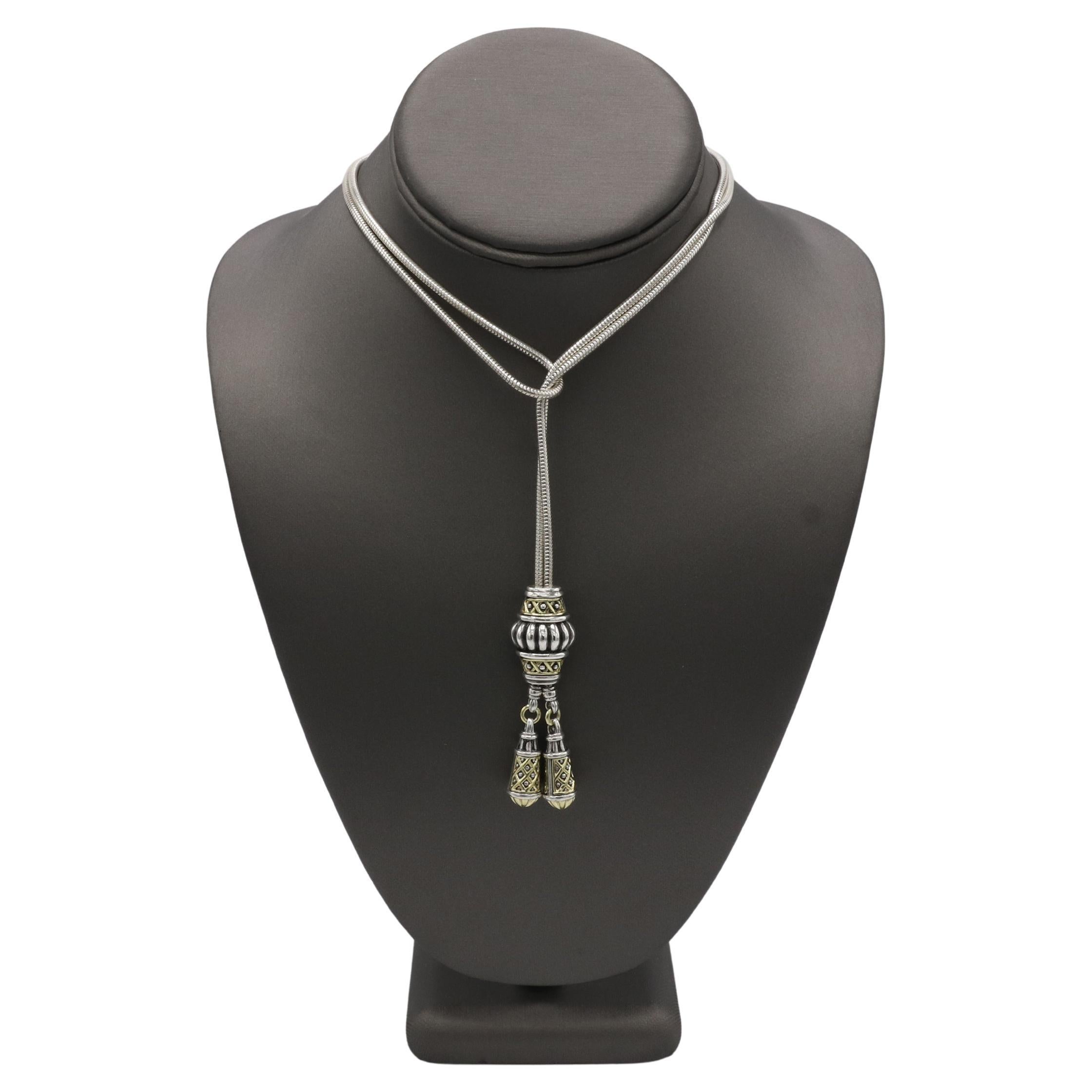 Lagos Caviar Sterling Silver & Gold Pendant Drop Necklace 
Metal: Sterling silver & 18k yellow gold
Weight: 48.2 grams
Drop: 2.25 inches
Chain: 34 inches 
Signed: Caviar 925 750