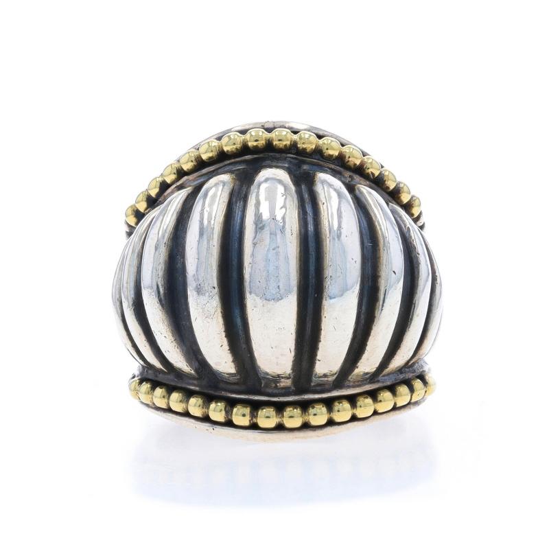 Size: 5 1/2
Sizing Fee: Up 1 1/2 sizes for $50 or Down 1 size for $50

Brand: Lagos
Collection: Caviar
Design:  Wide Fluted Band

Metal Content: Sterling Silver & 18k Yellow Gold

Style: Statement Band

Measurements

Face Height (north to south):