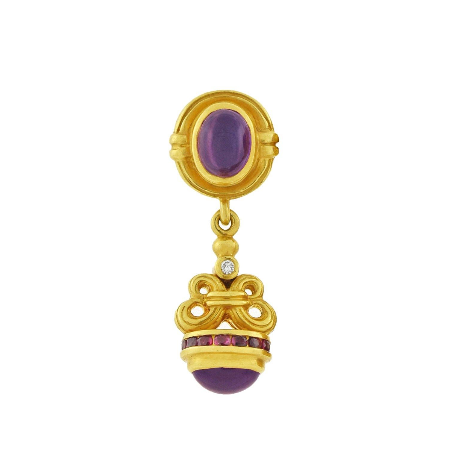 A stunning pair of Estate gemstone earrings by prestigious Philadelphia based designer Lagos! Each earring is crafted in a luxurious matte 22kt yellow gold, and displays a wonderful 3-dimensional design which displays colorful gemstones, visible