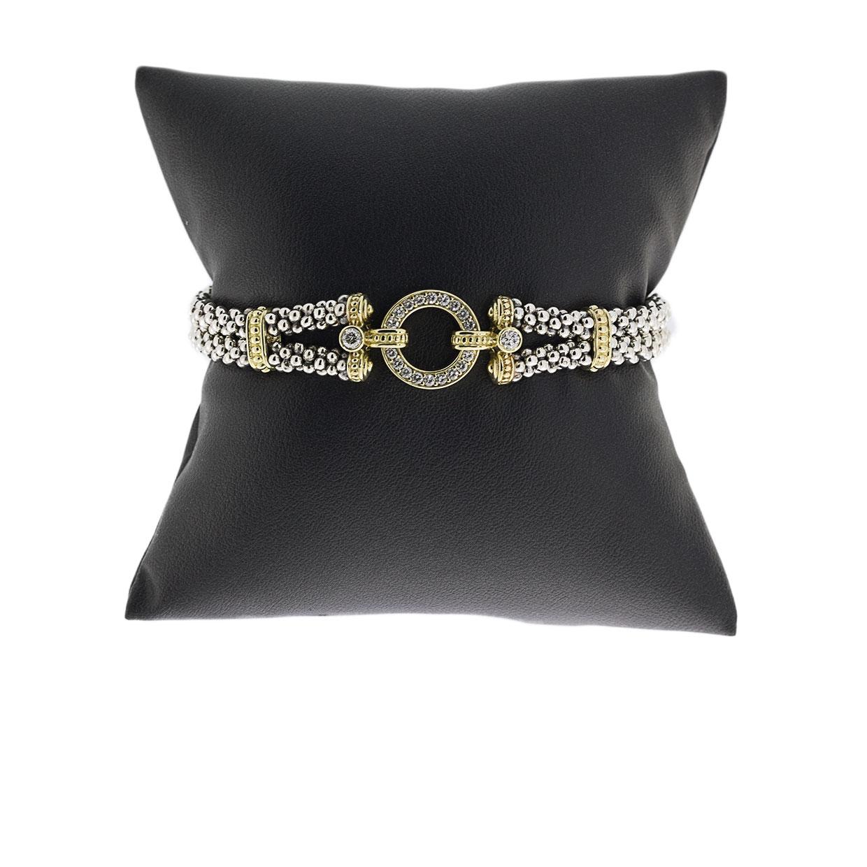 Item Details:
Estimated Retail - $2,750.00
Brand - Lagos
Collection - Enso/Circle Game
Metal - 18 Karat Yellow Gold & 925 Sterling Silver
Total Carat Weight (TCW) - 0.56 ctw
Length (Inches) - 7.0 in
Width - 13.75 mm
Fastening - Lagos Signature Box