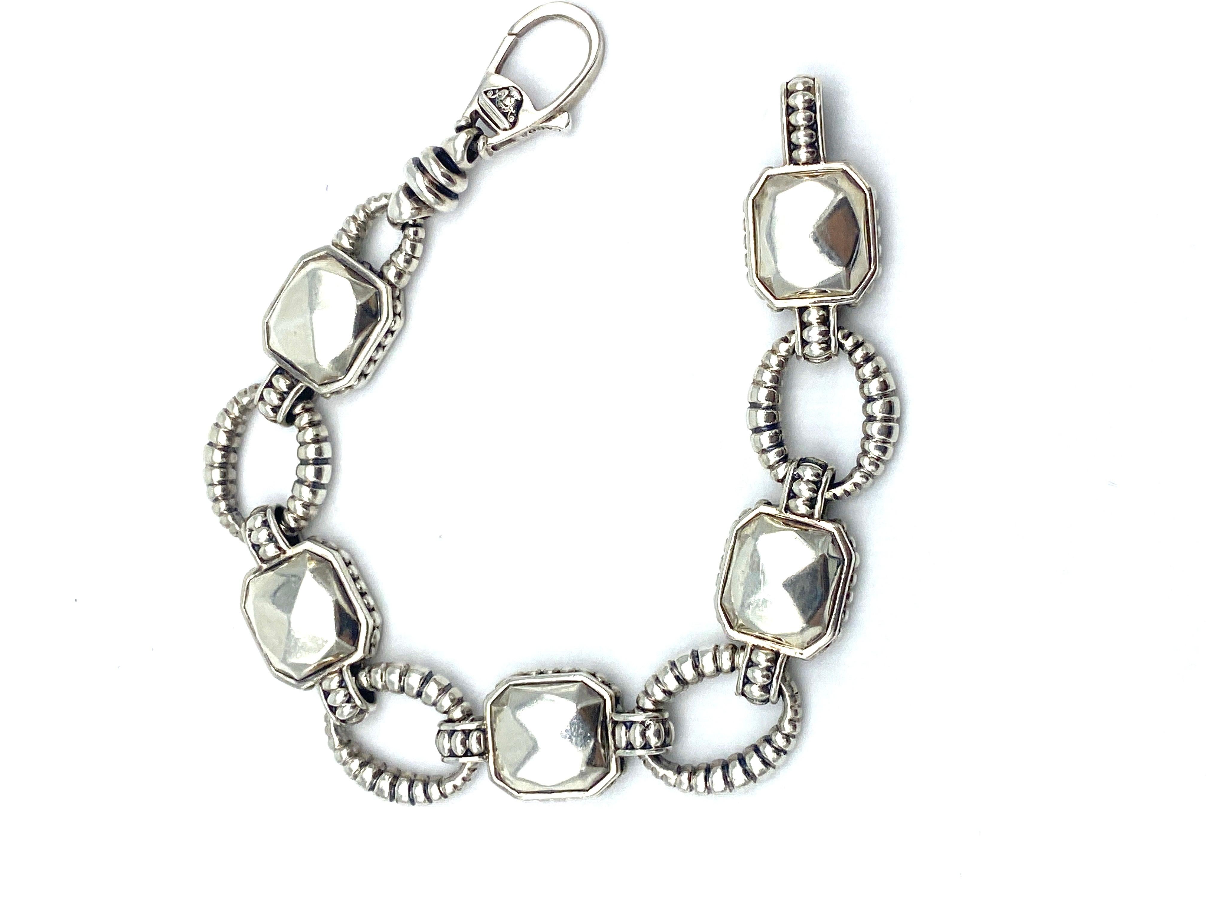 Designer names Lagos link bracelet is shiny links separated by textured hoops. 
Stunning, the Lagos name is hallmarked on the clasp


Weight is 36.50 grams
Length is 7.25